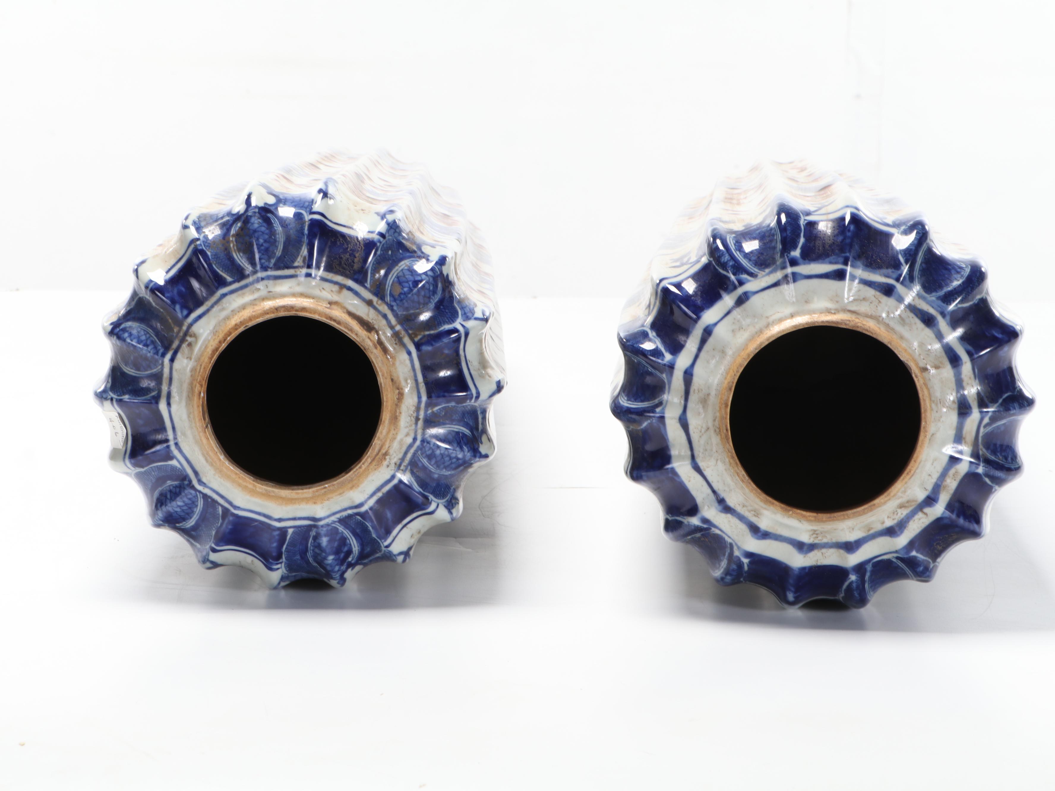 Pair of Chinese Kangxi Style Blue and White Porcelain Guardian Lion Ribbed Jars