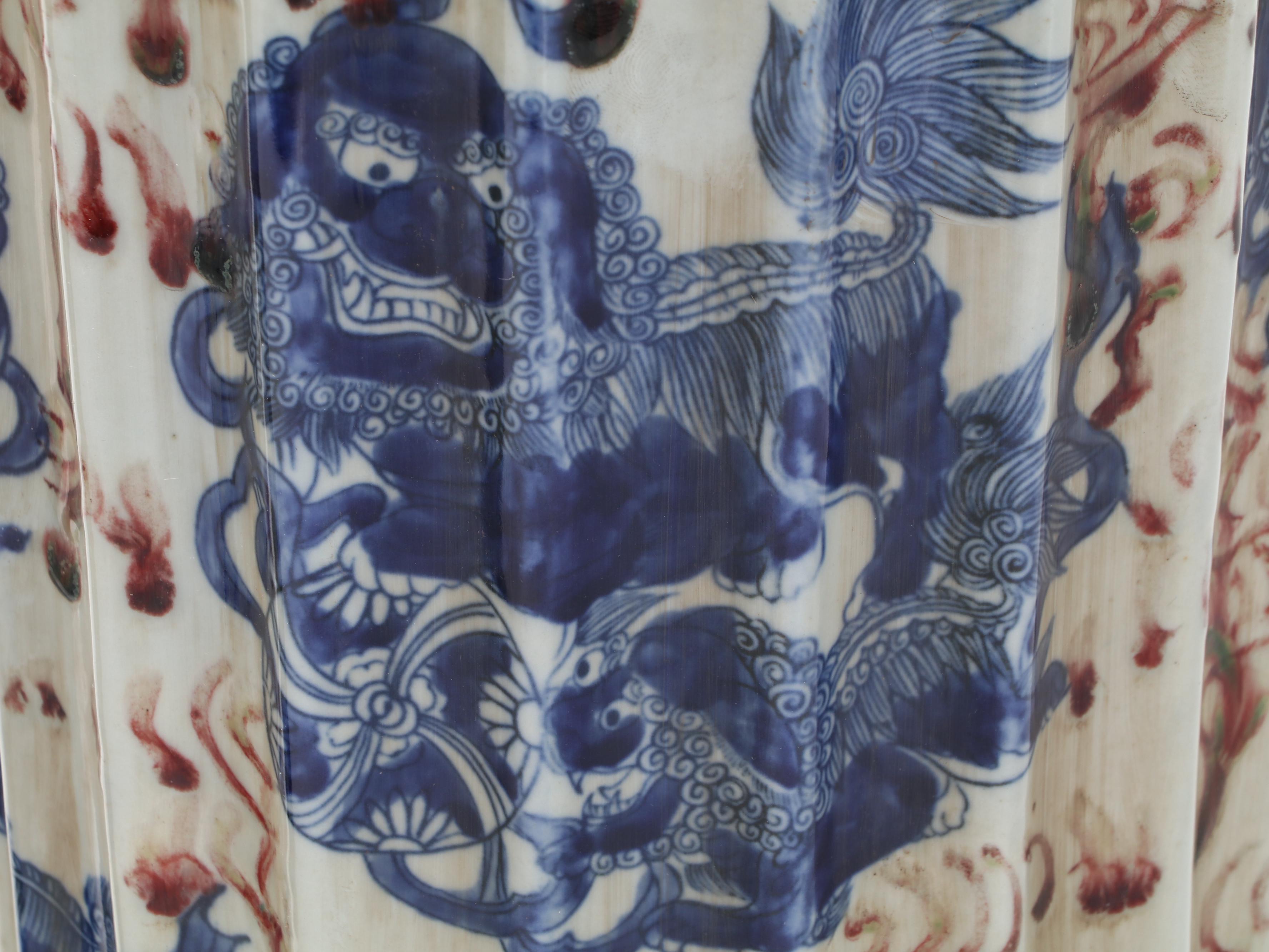 Pair of Chinese Kangxi Style Blue and White Porcelain Guardian Lion Ribbed Jars