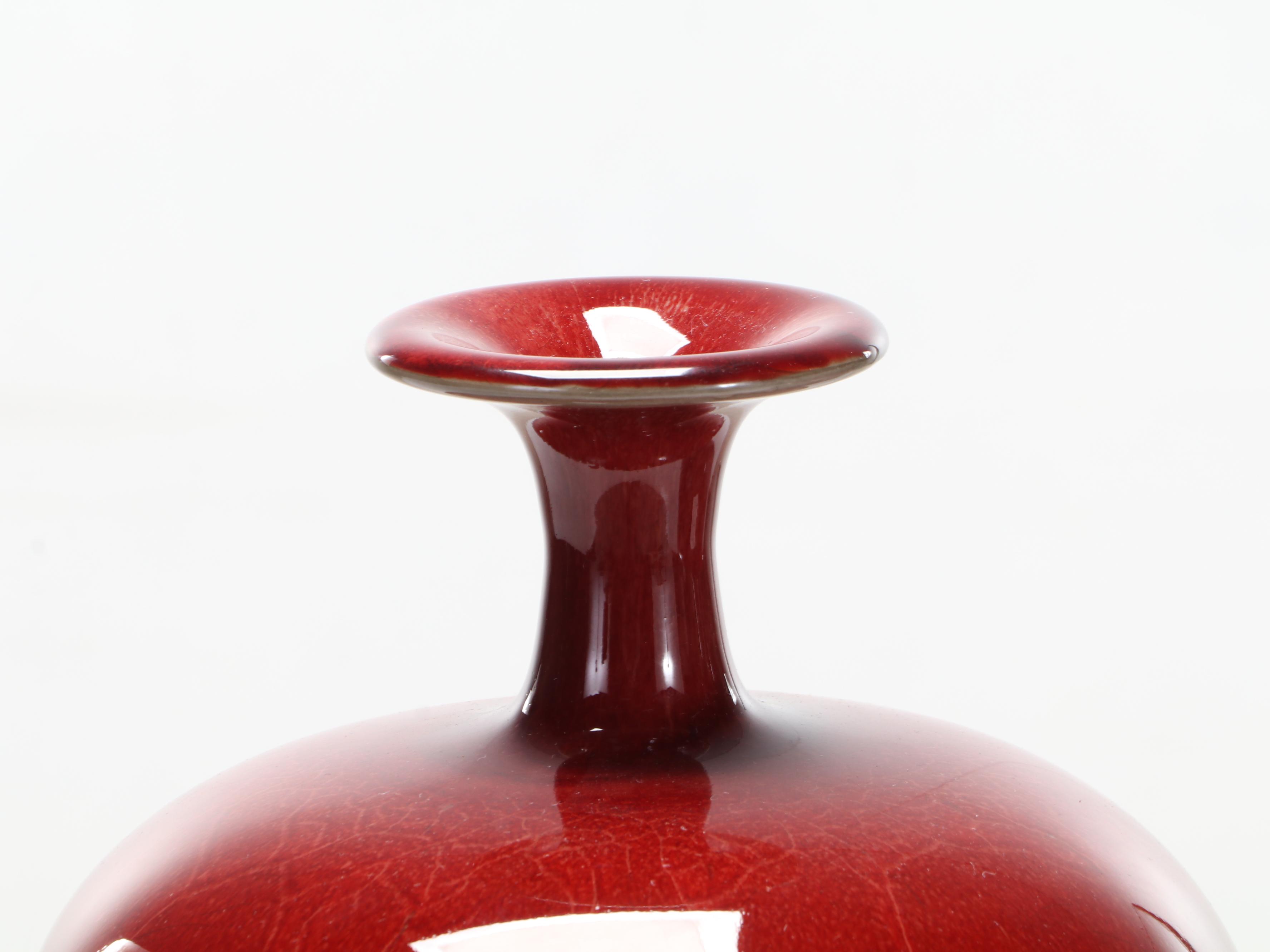 Pair of Chinese Sang de Boeuf Glazed Meiping Vases