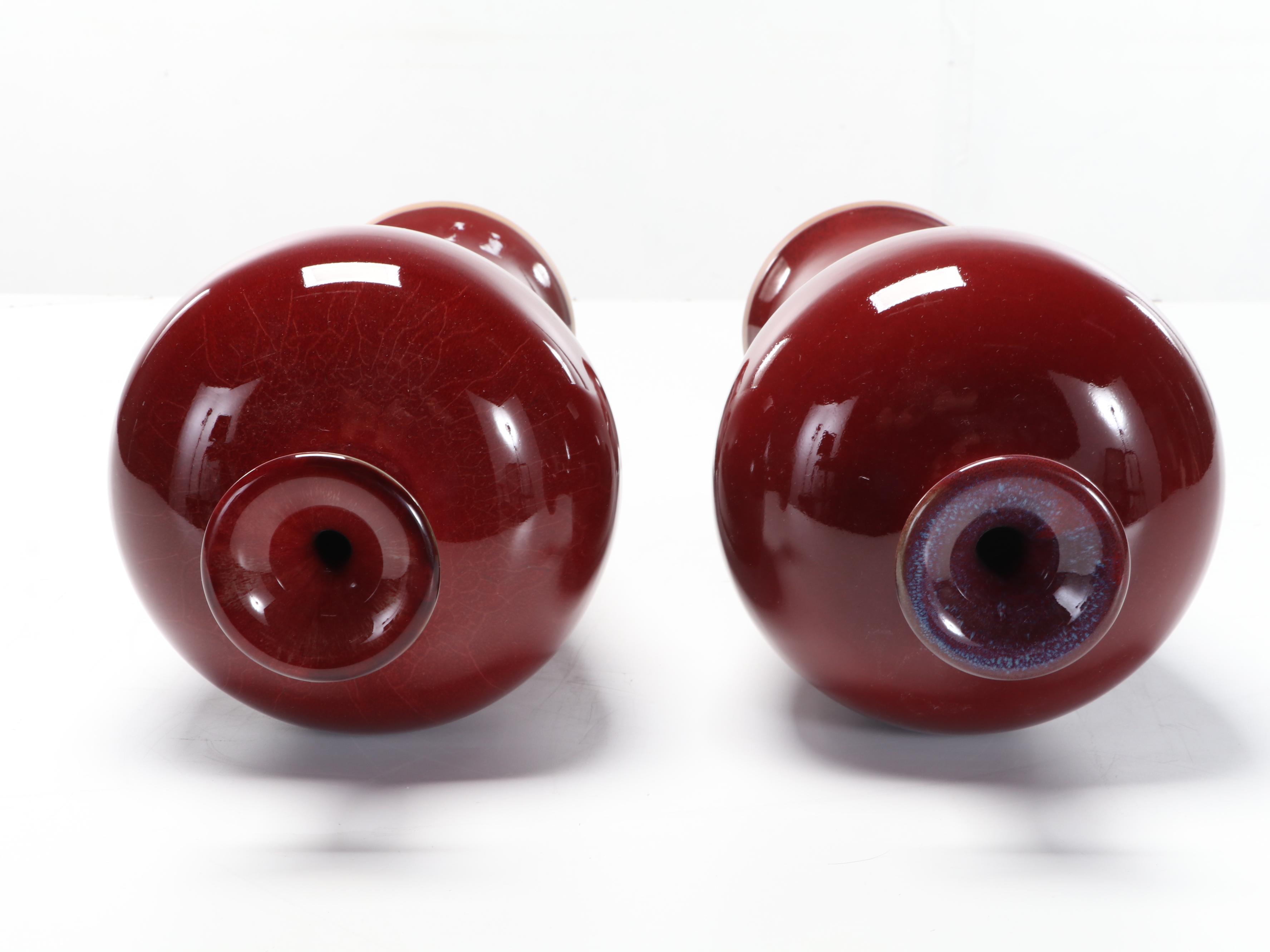 Pair of Chinese Sang de Boeuf Glazed Meiping Vases