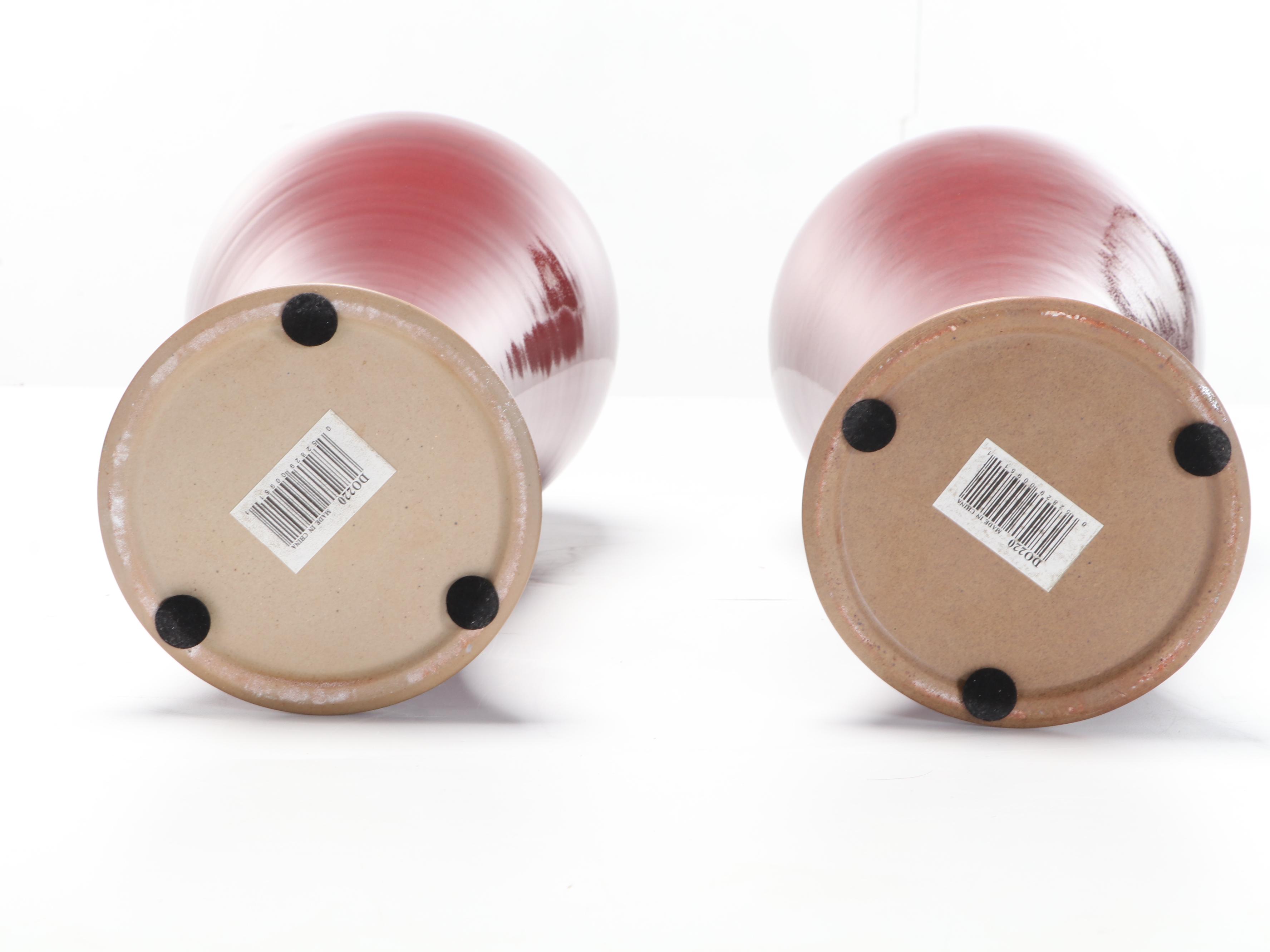 Pair of Chinese Sang de Boeuf Glazed Meiping Vases