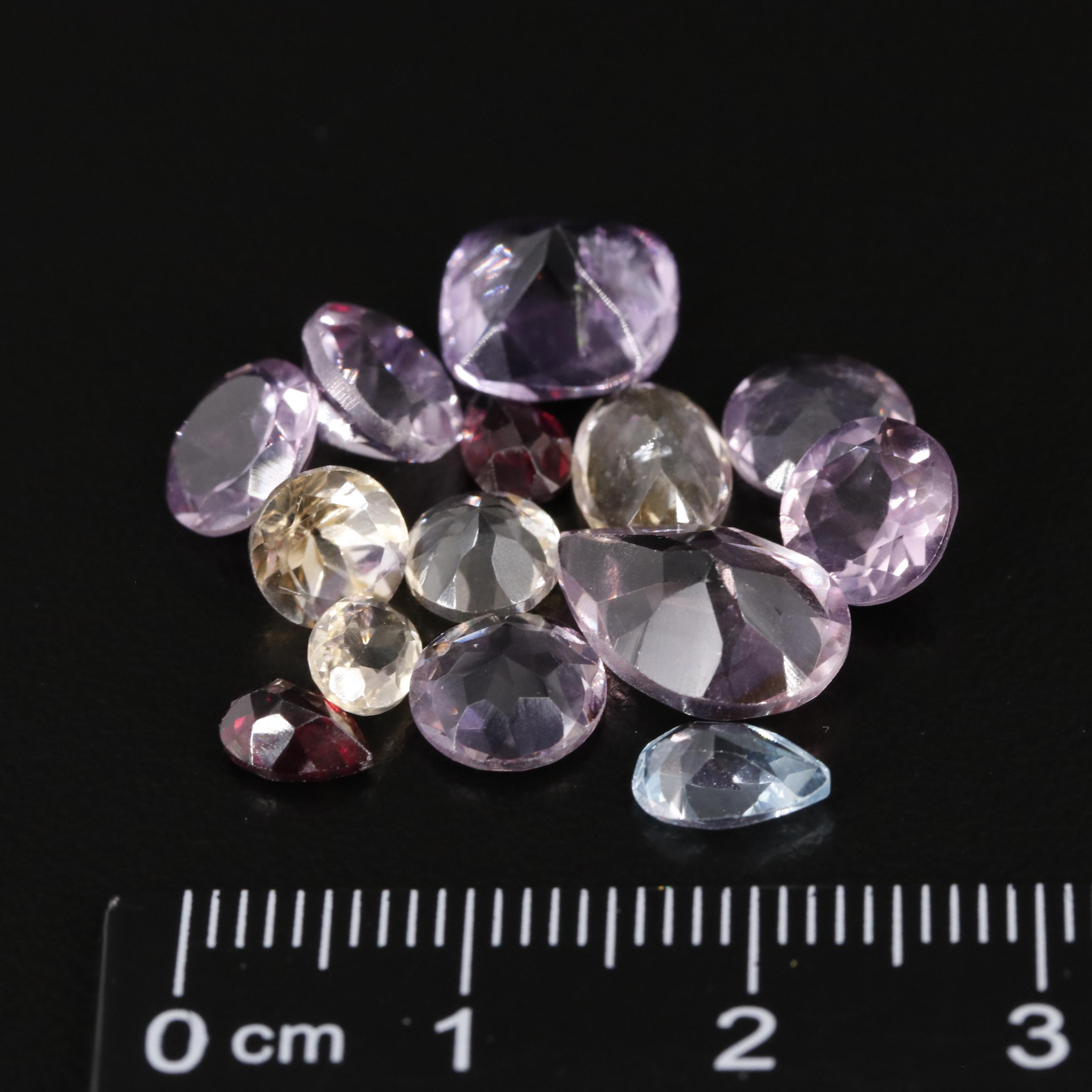 Loose 16.55 CTW Mixed Gemstone Lot Featuring Amethyst Citrine and Garnet