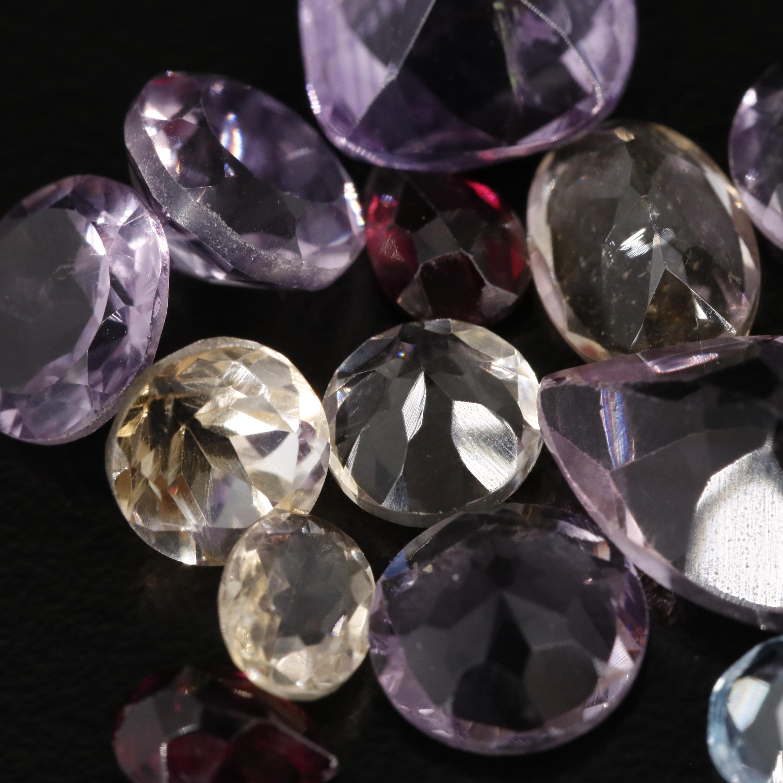 Loose 16.55 CTW Mixed Gemstone Lot Featuring Amethyst Citrine and Garnet