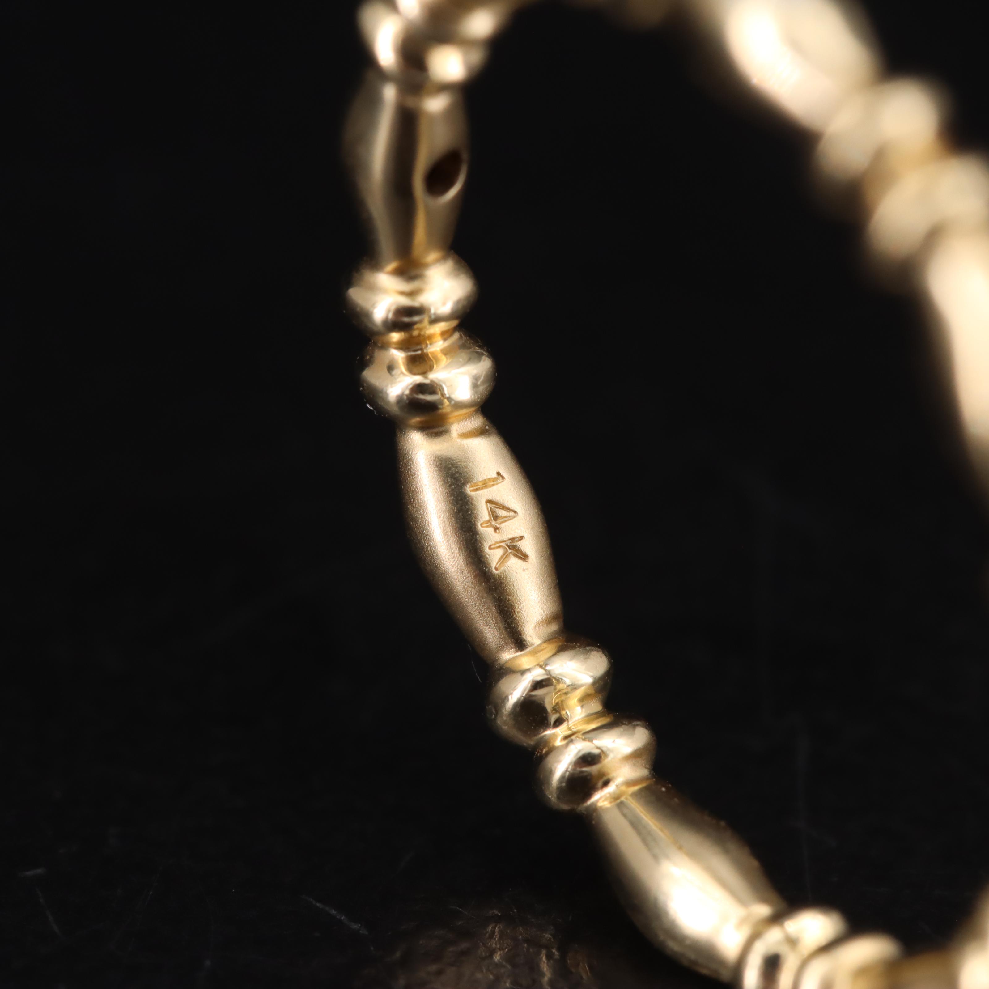 14K 0.07 CTW Diamond Band