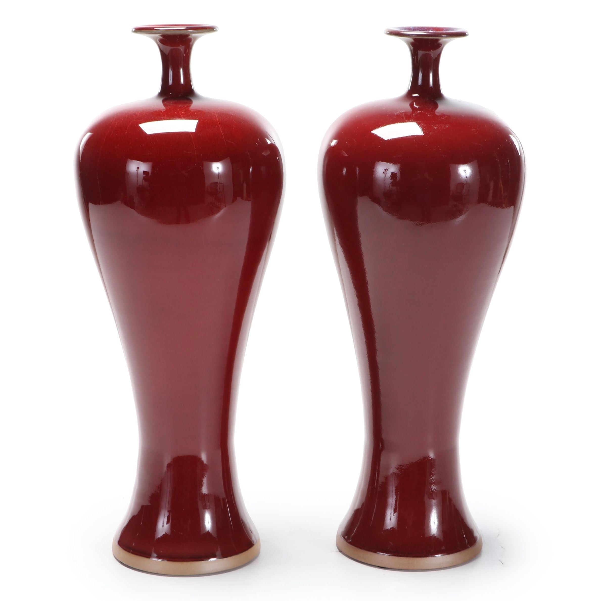 Pair of Chinese Sang de Boeuf Glazed Meiping Vases