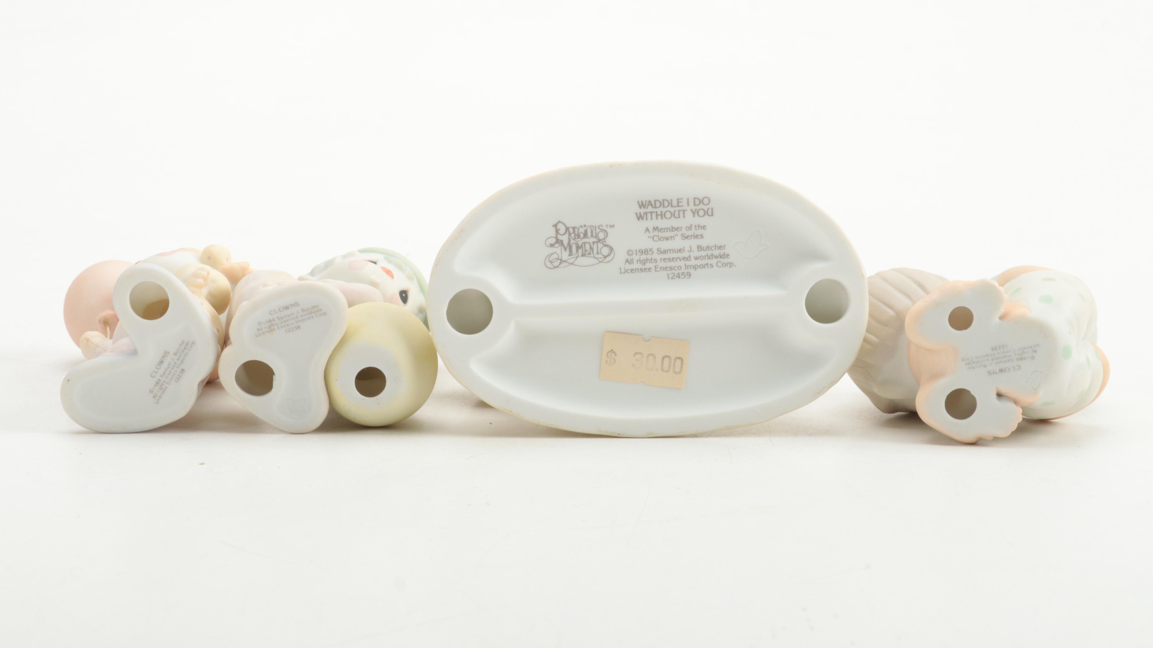 Precious Moments Porcelain Figurines Including "Meowie Christmas," and More