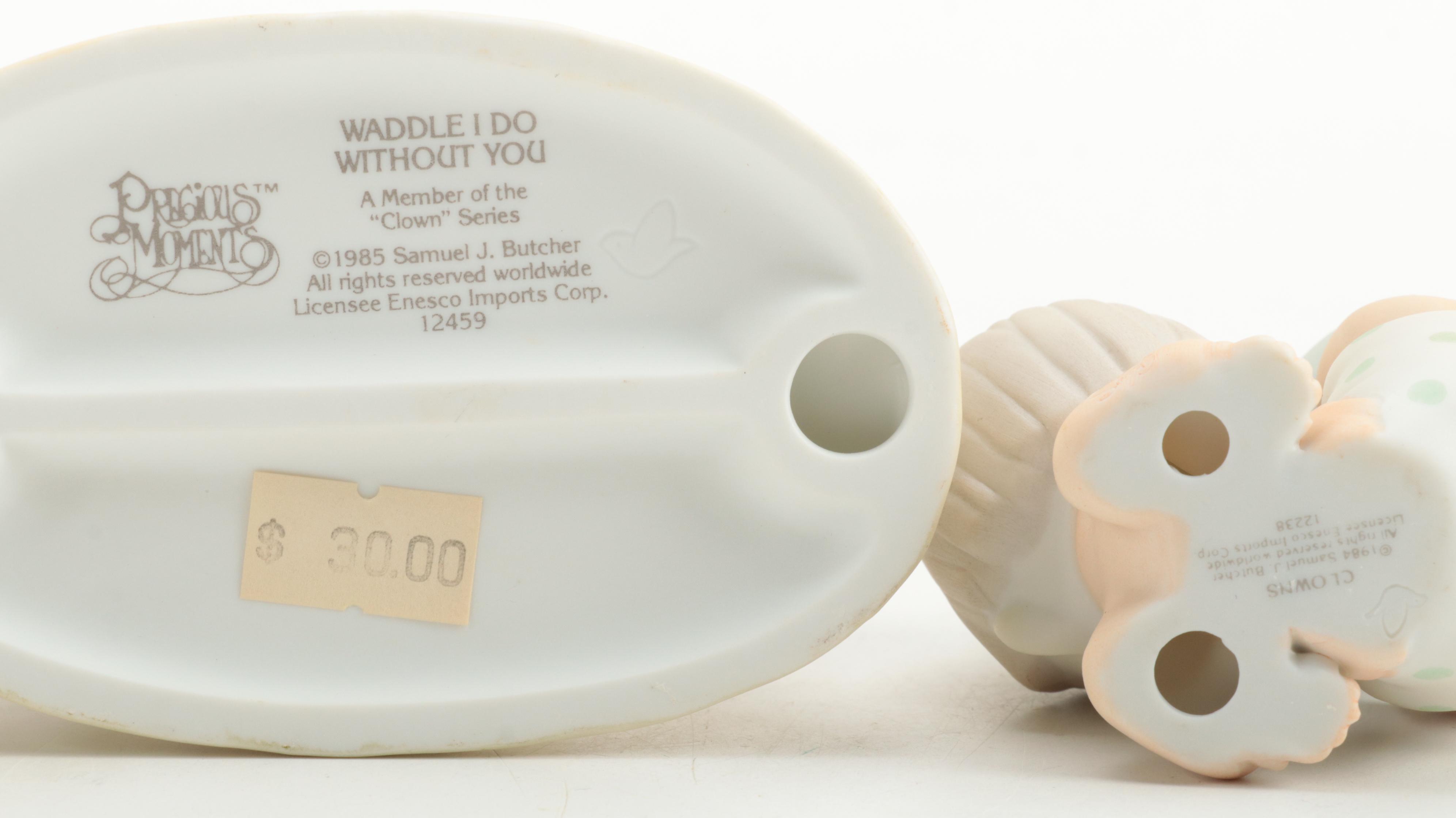 Precious Moments Porcelain Figurines Including "Meowie Christmas," and More