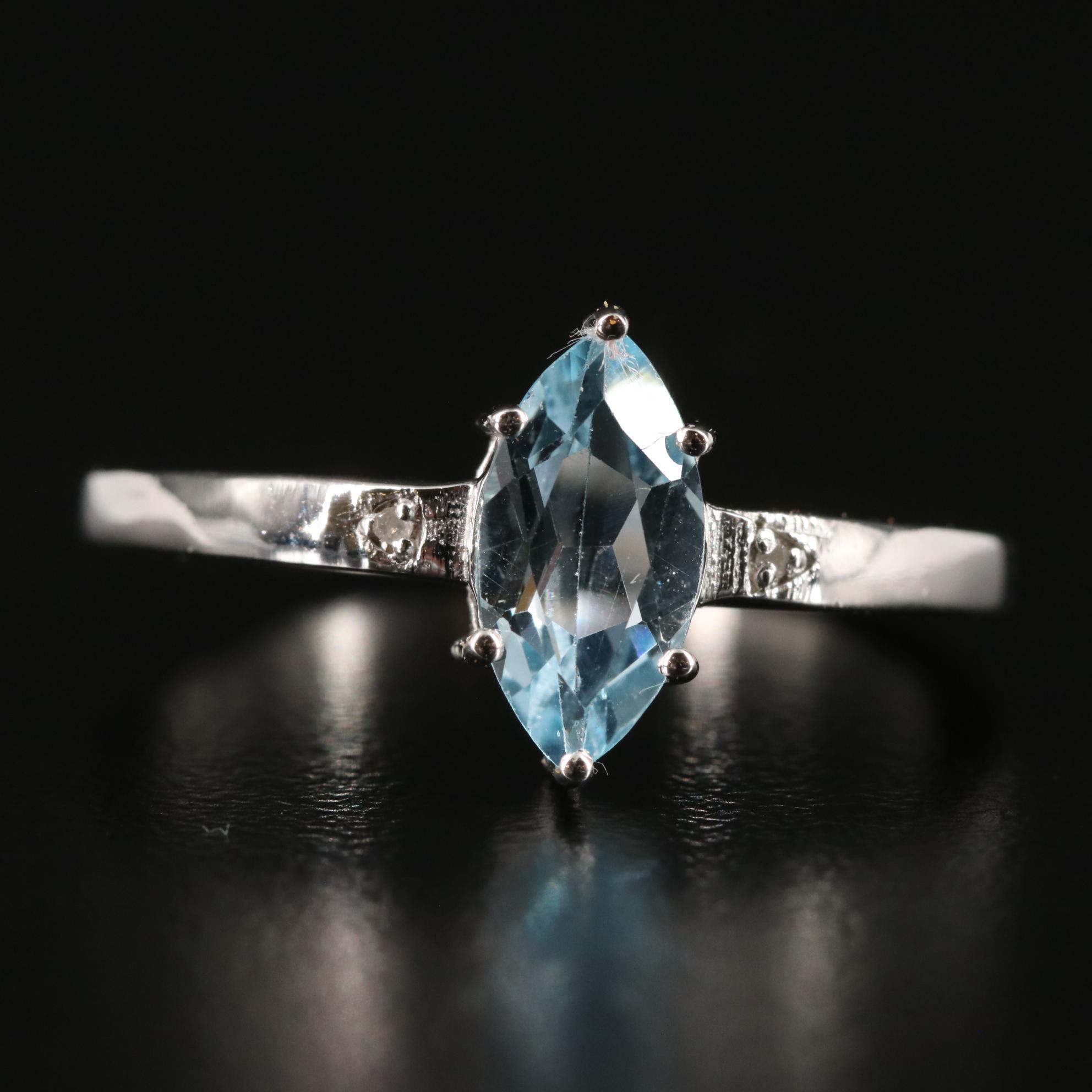 Sterling Blue Topaz and Diamond Ring