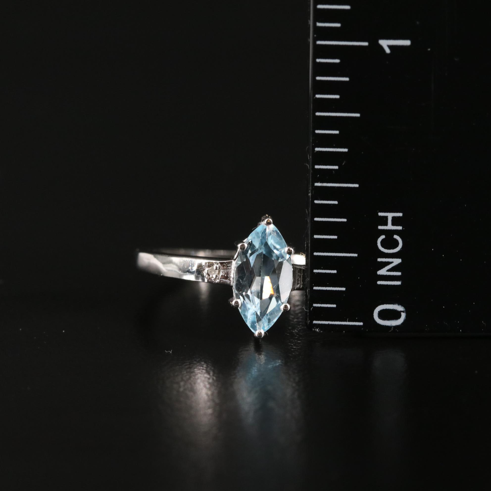 Sterling Blue Topaz and Diamond Ring