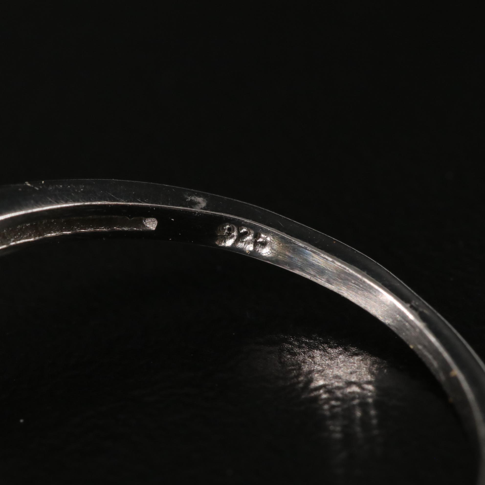 Sterling Blue Topaz and Diamond Ring