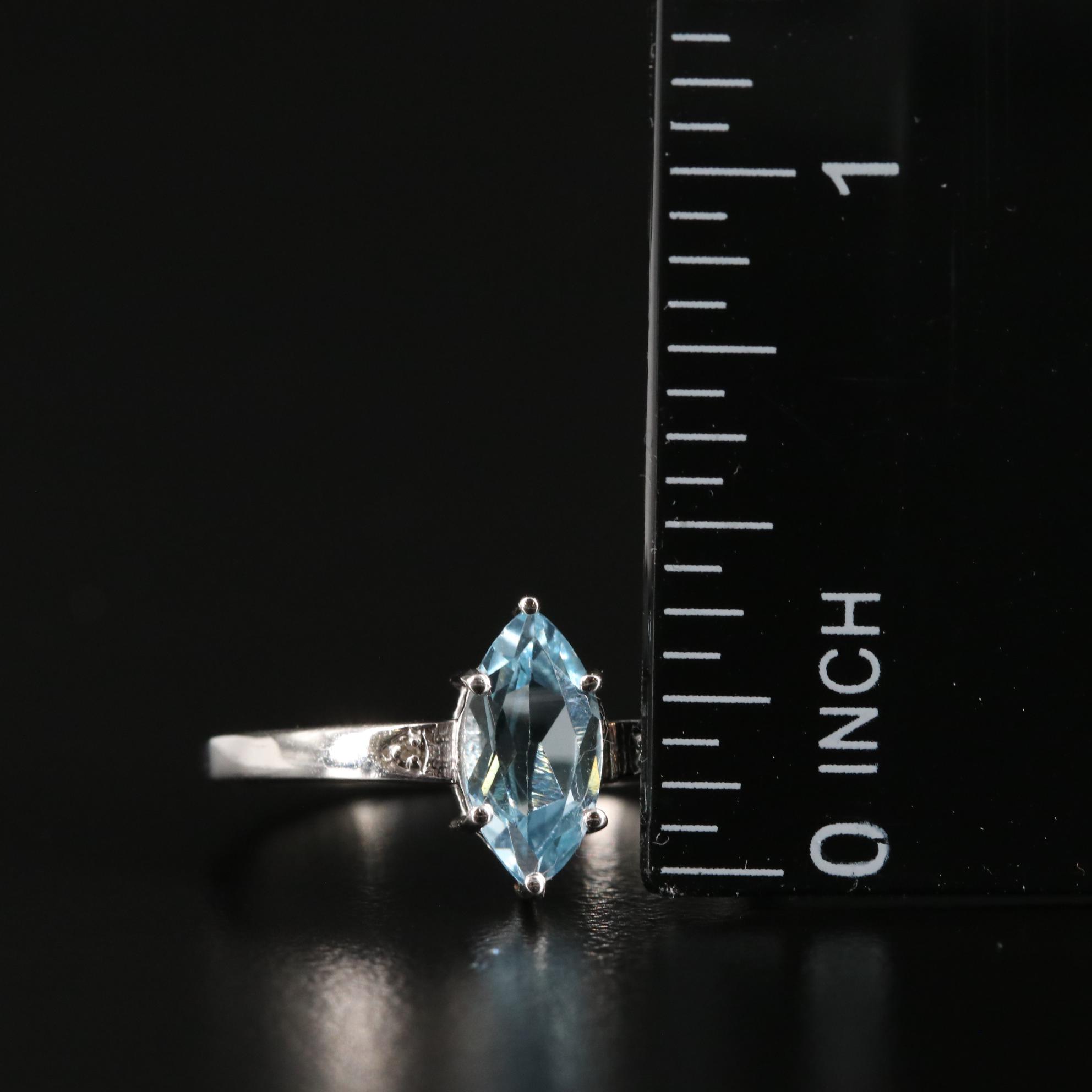 Sterling Blue Topaz and Diamond Ring