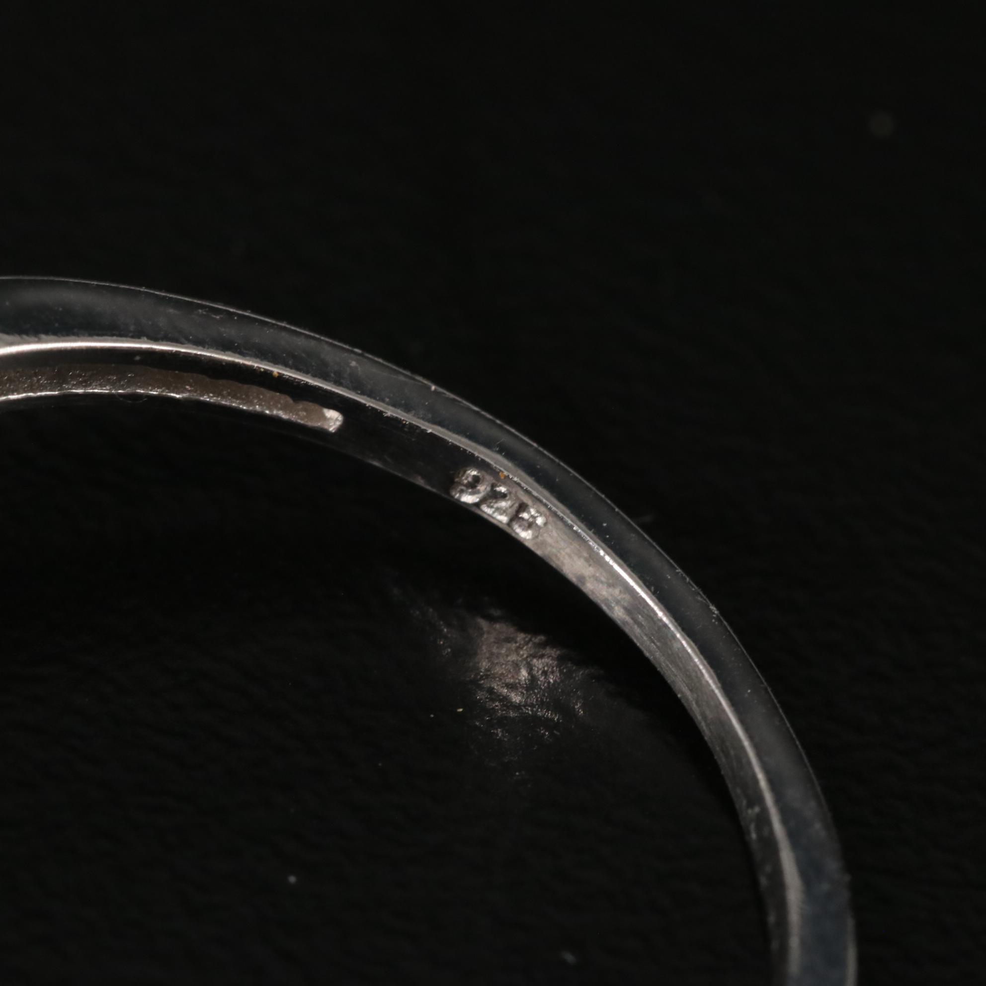 Sterling Blue Topaz and Diamond Ring