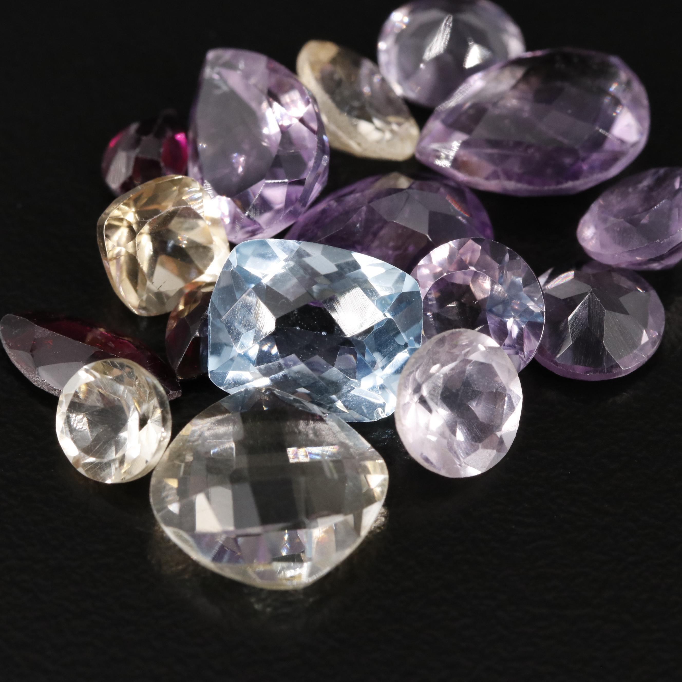 Loose 24.76 CTW Mixed Gemstone Lot Featuring Amethyst Citrine and Garnet