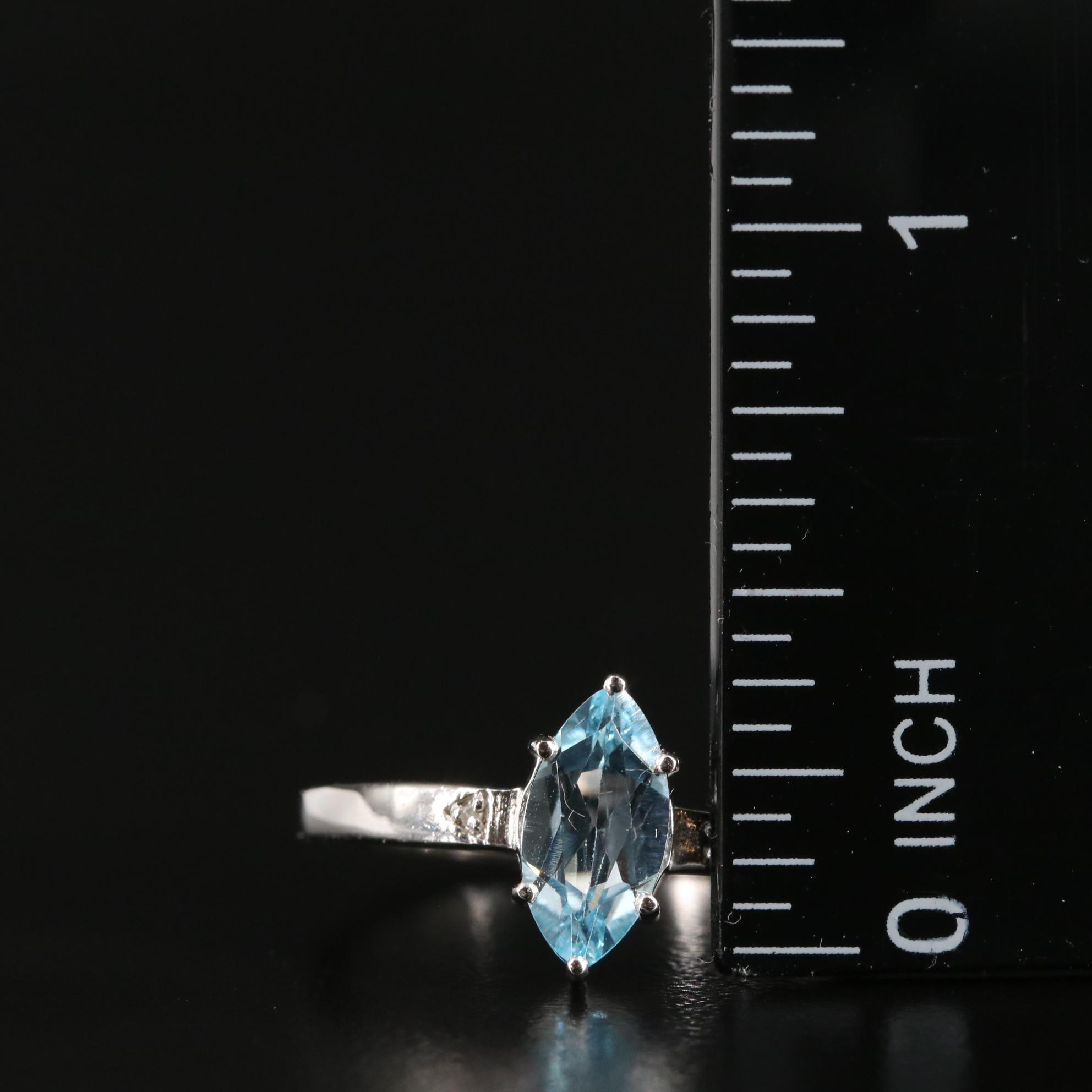 Sterling Blue Topaz and Diamond Ring