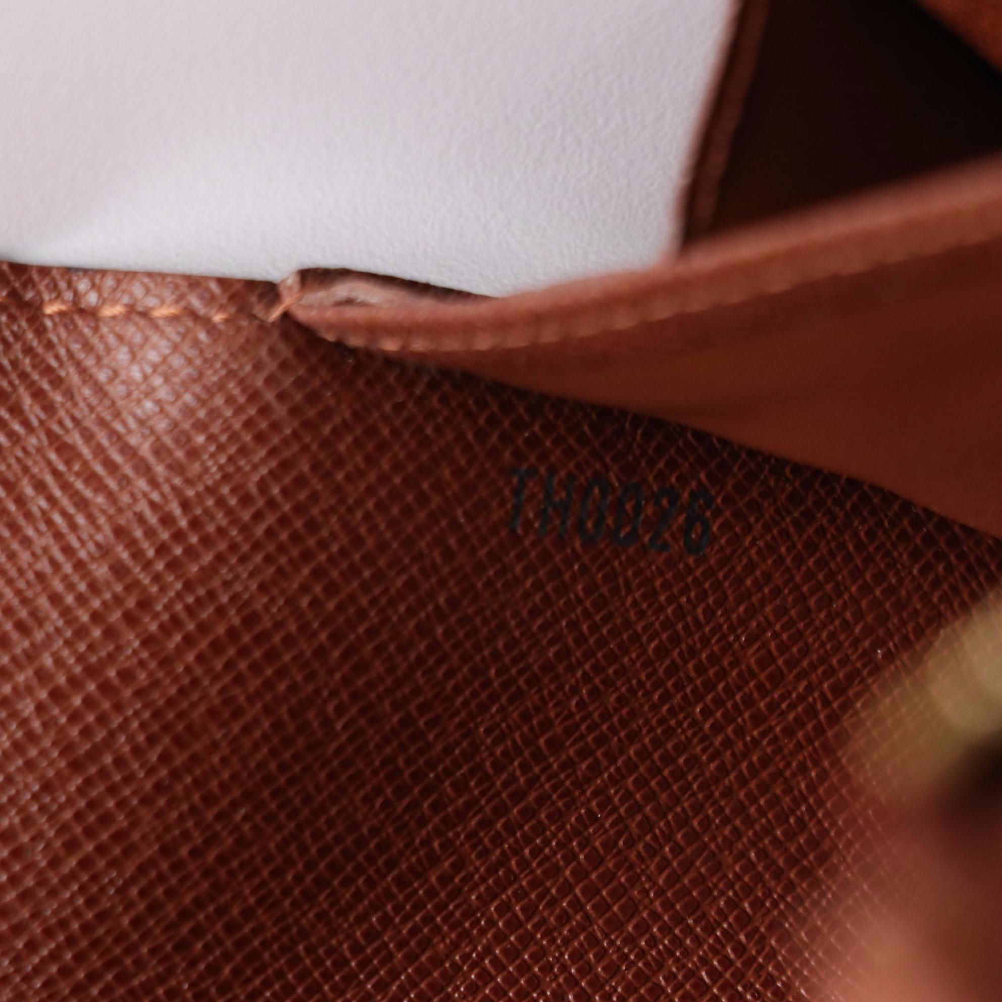 Louis Vuitton Sarah Wallet in Monogram Canvas