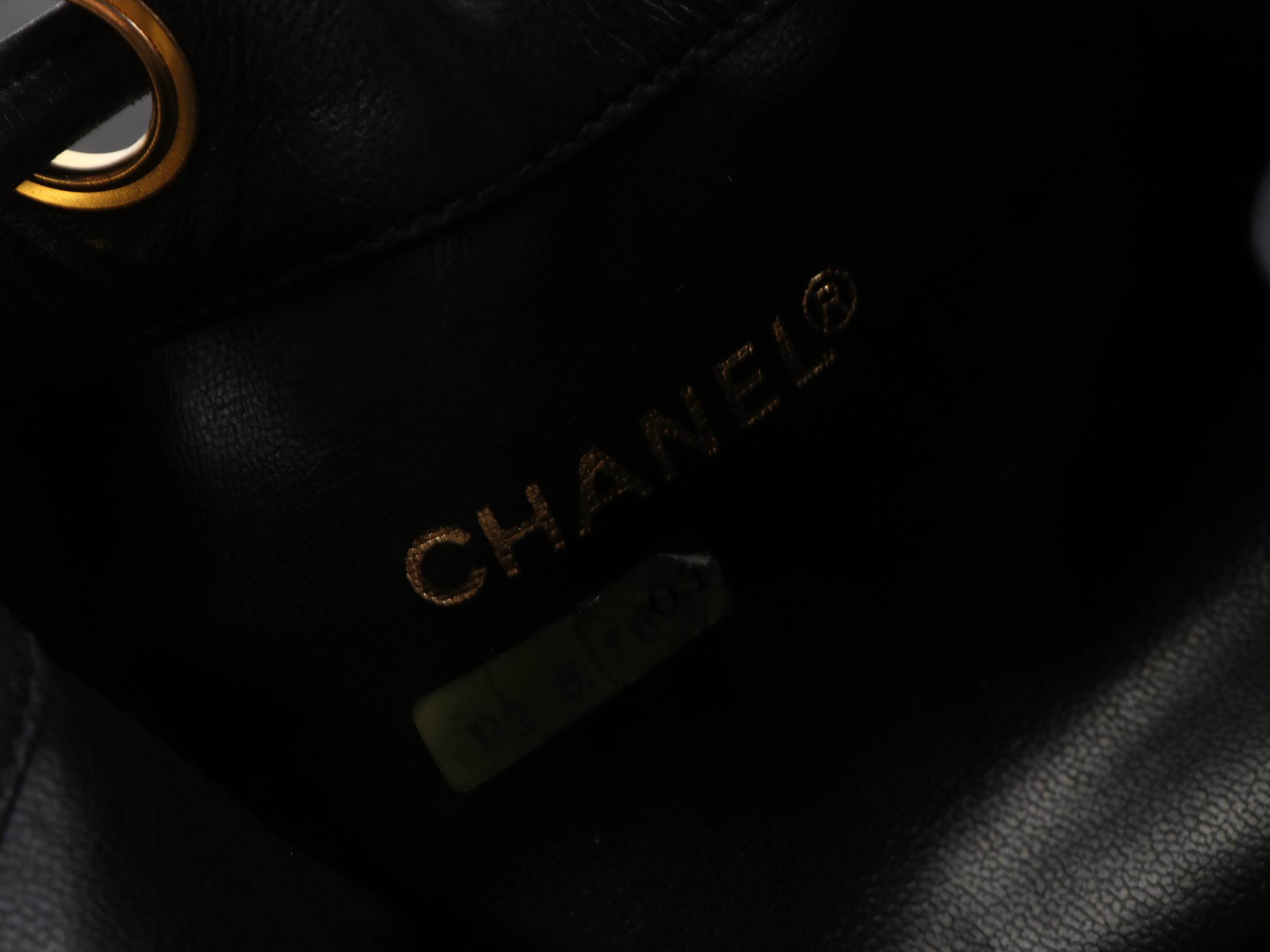 Chanel CC Drawstring Bucket Bag in Black Leather with Zip Pouch