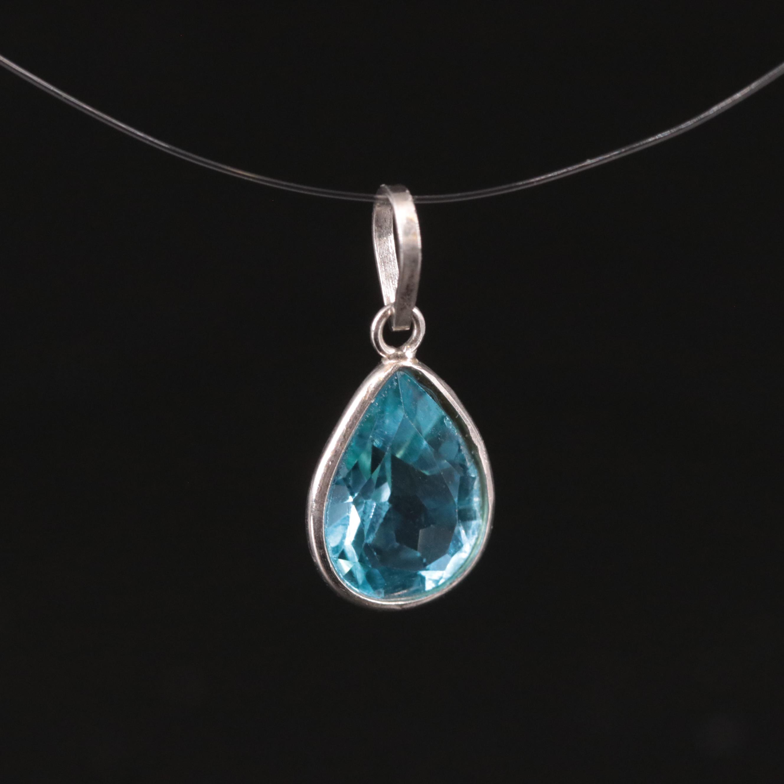 14K Swiss Blue Topaz Pendant