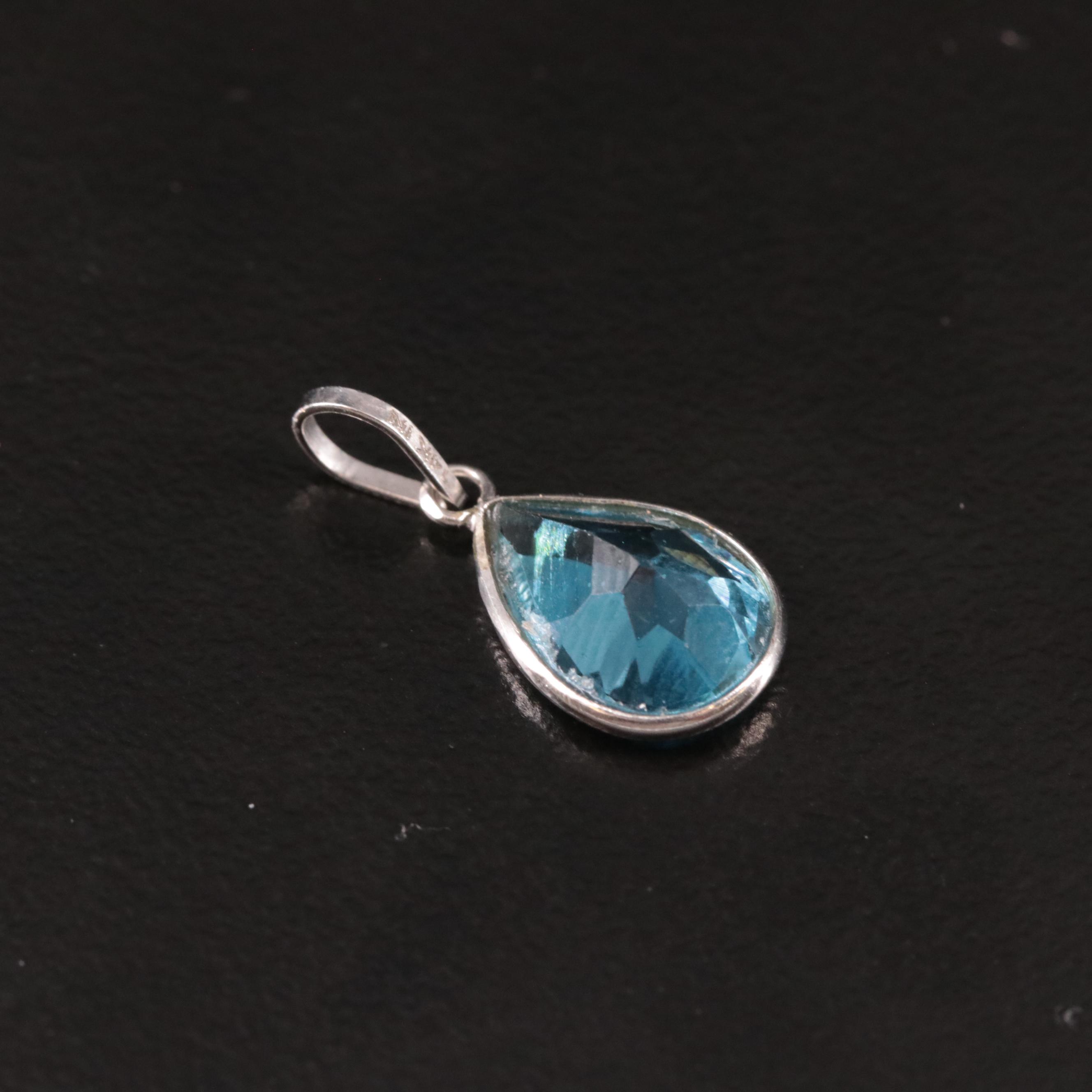 14K Swiss Blue Topaz Pendant