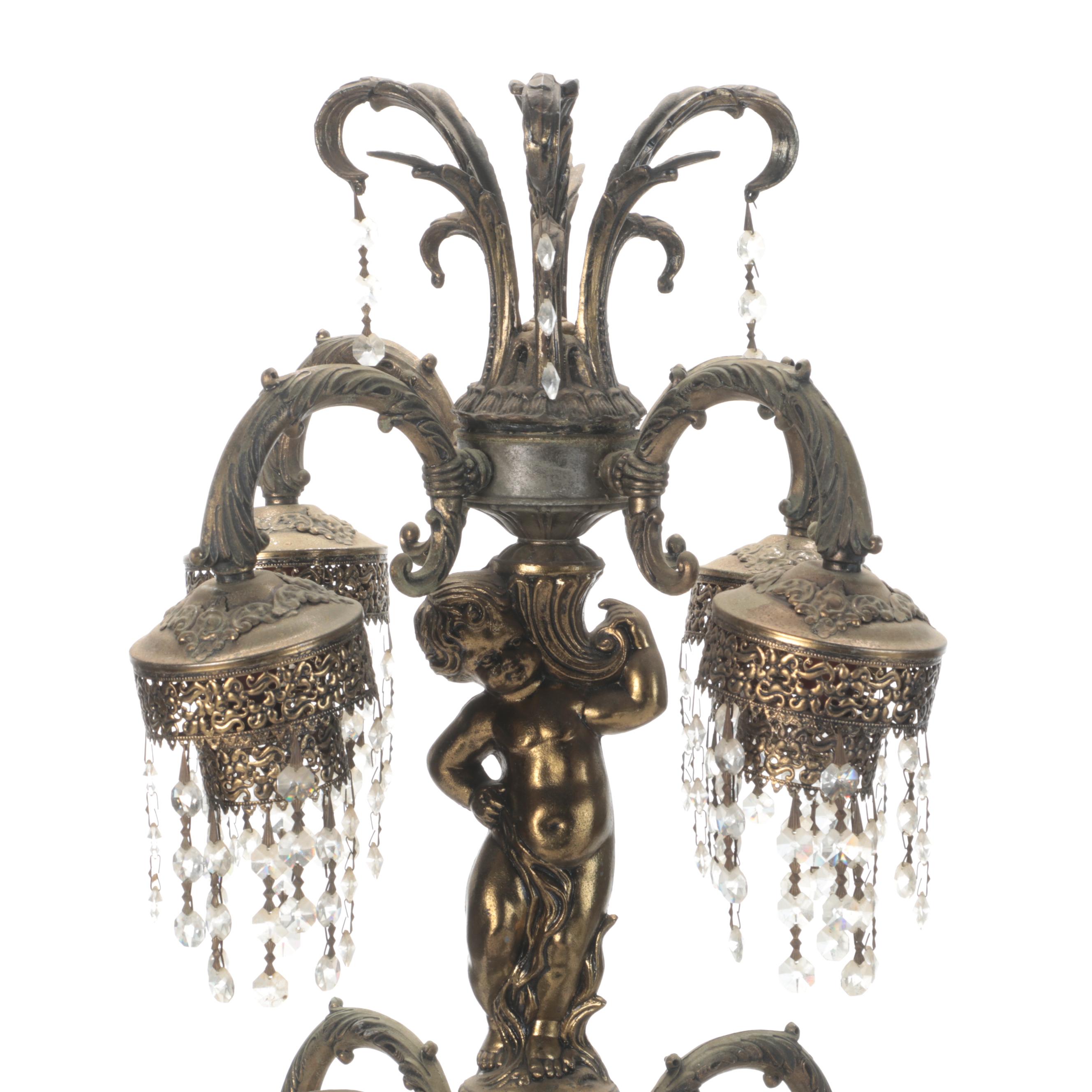 Pair of Hollywood Regency Gilt Metal Putti Tiered Lamps, Mid-20th Century