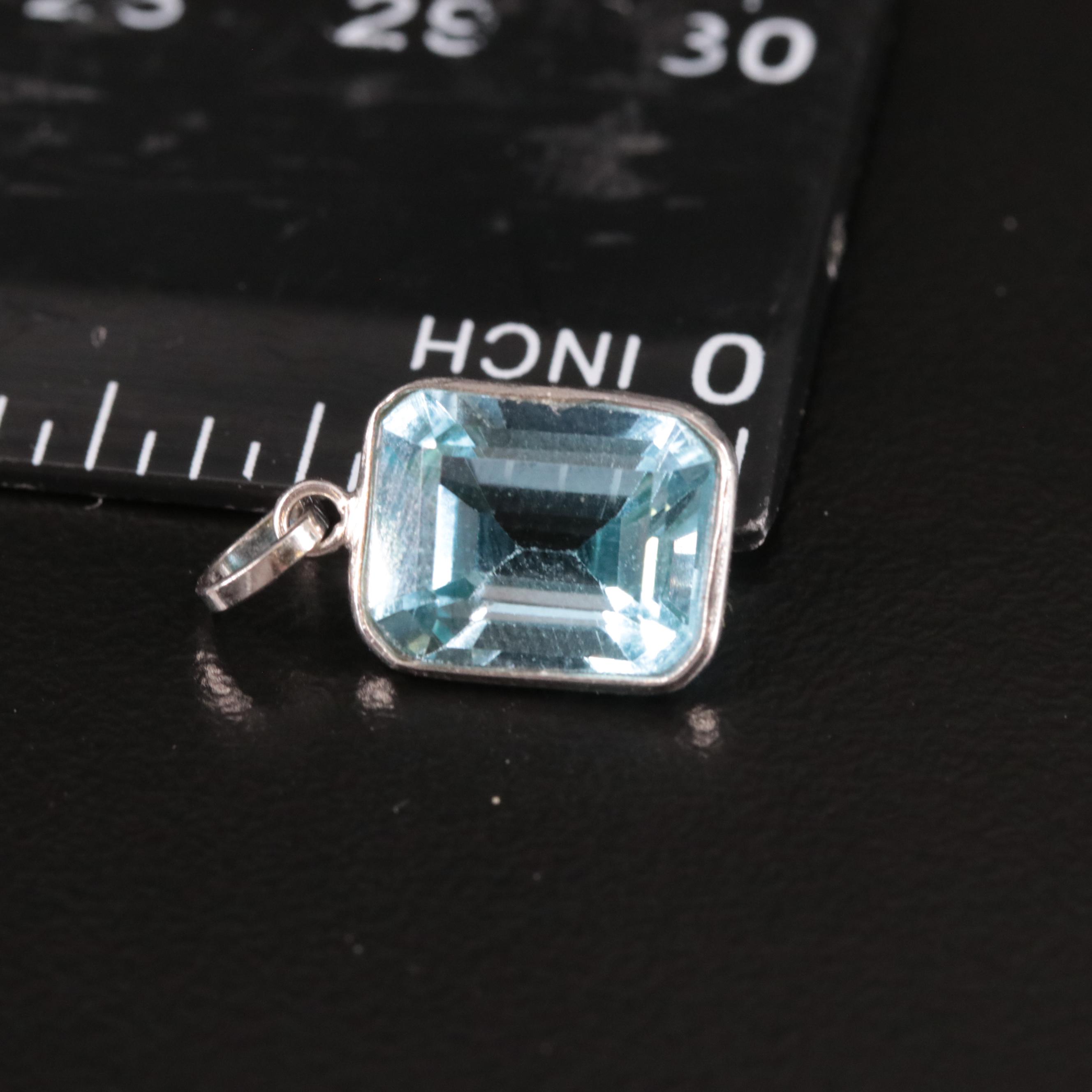 14K Blue Topaz Pendant