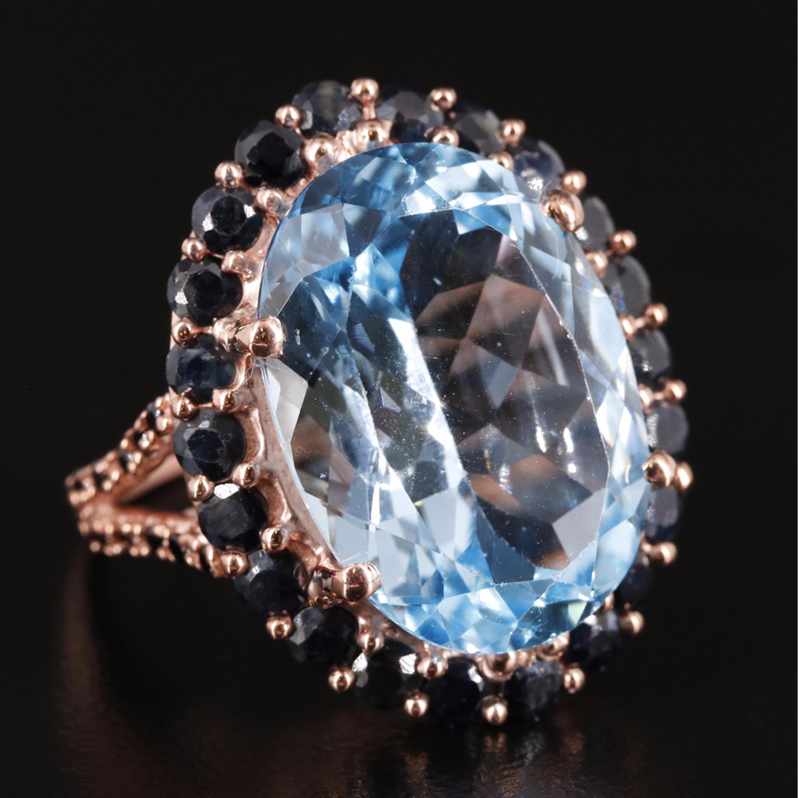 Sterling Blue Topaz and Sapphire Halo Ring