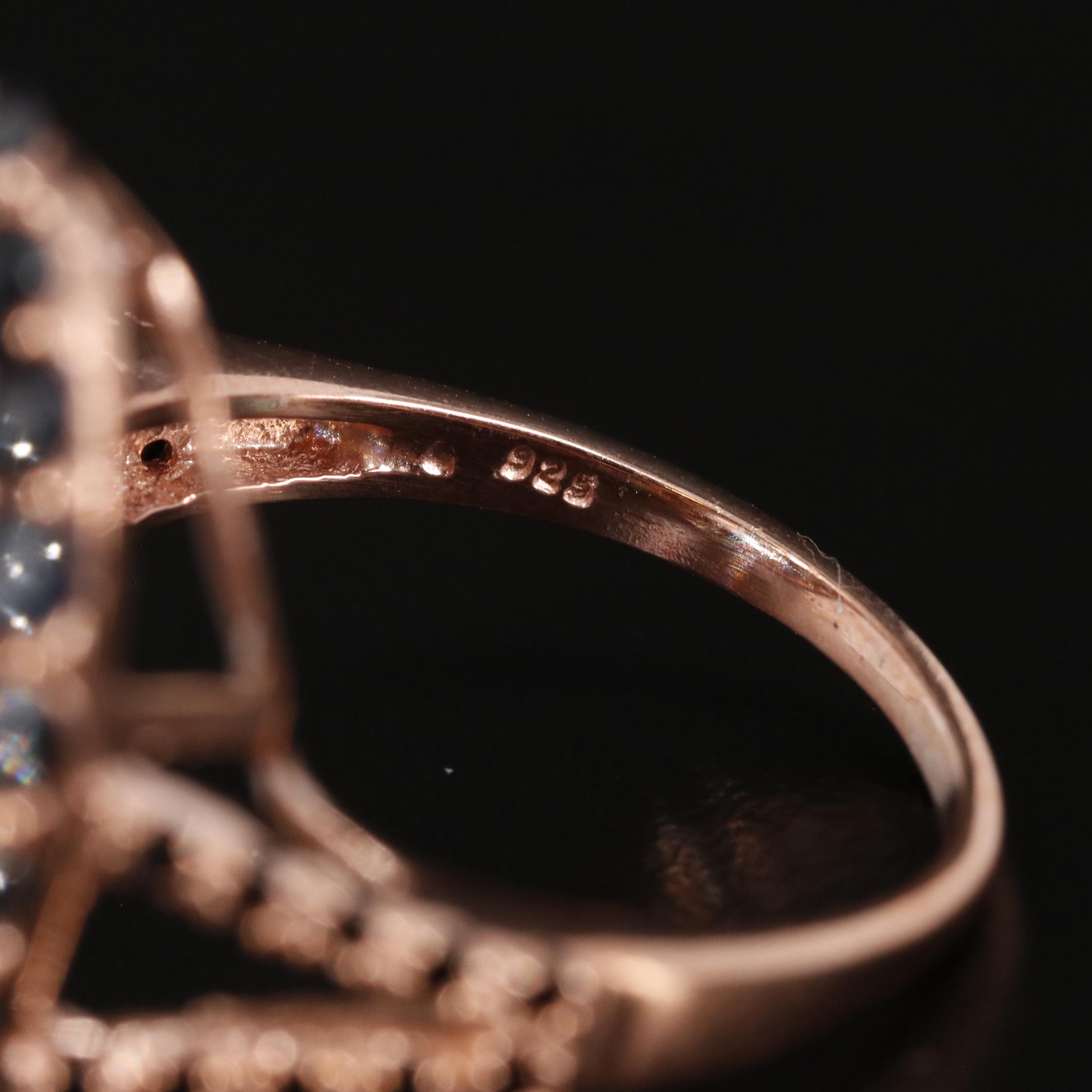 Sterling Blue Topaz and Sapphire Halo Ring