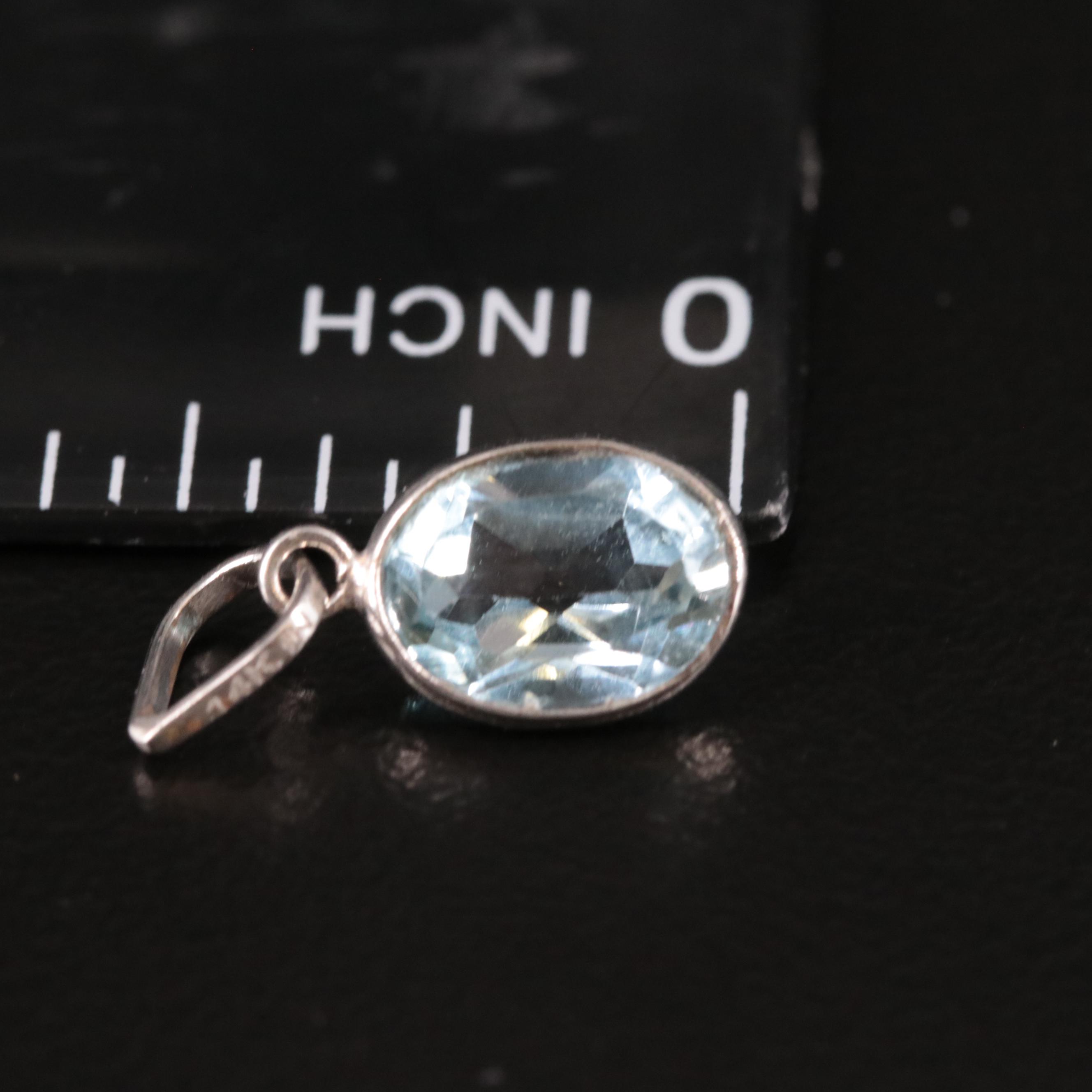 14K Blue Topaz Pendant
