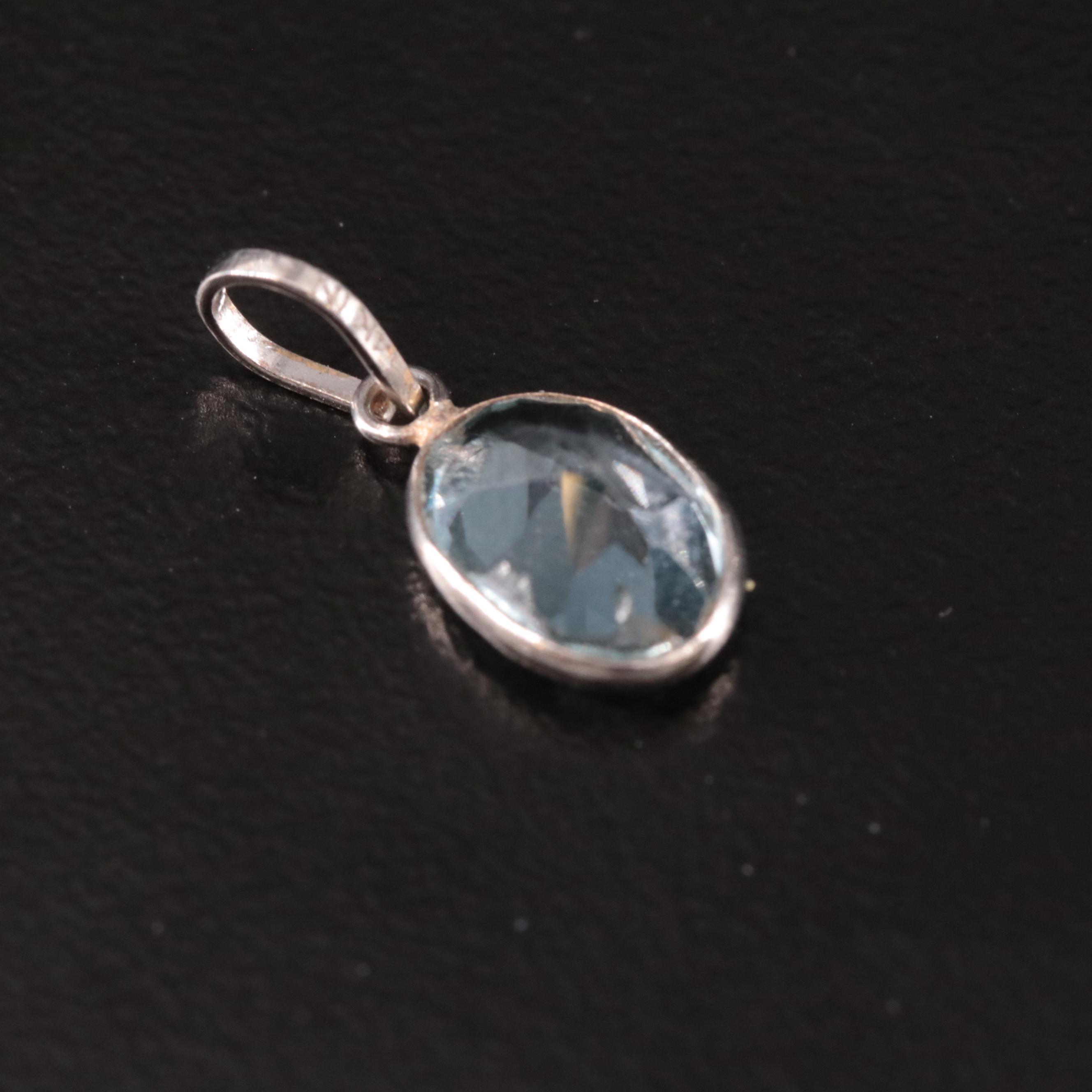 14K Blue Topaz Pendant