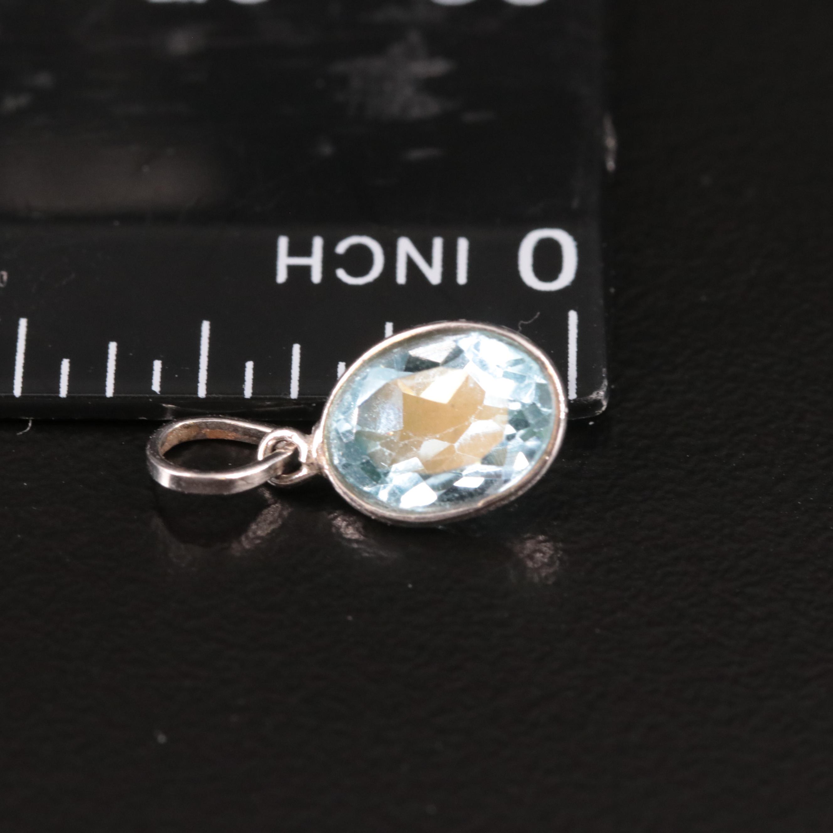14K Blue Topaz Pendant