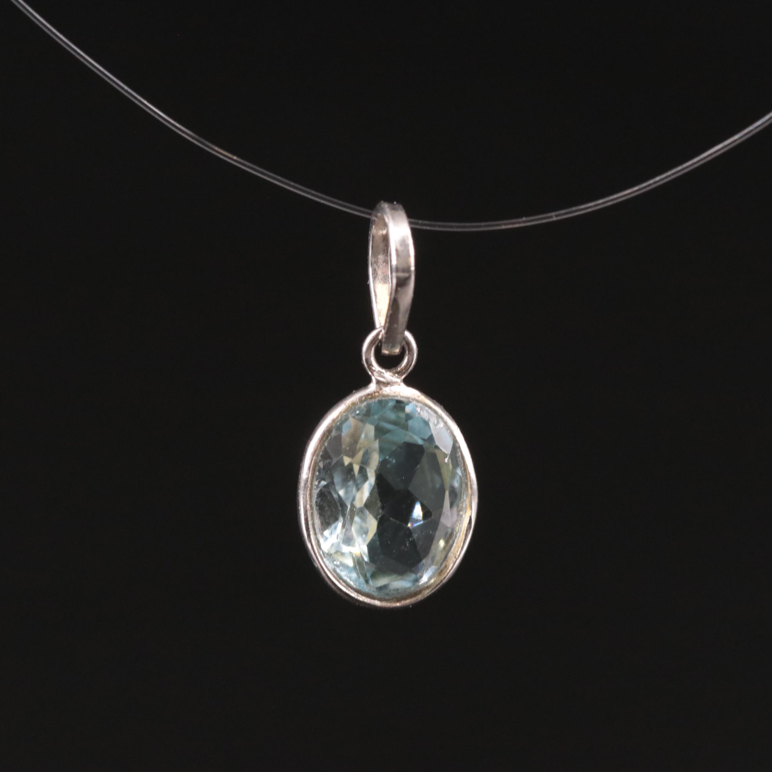 14K Blue Topaz Pendant