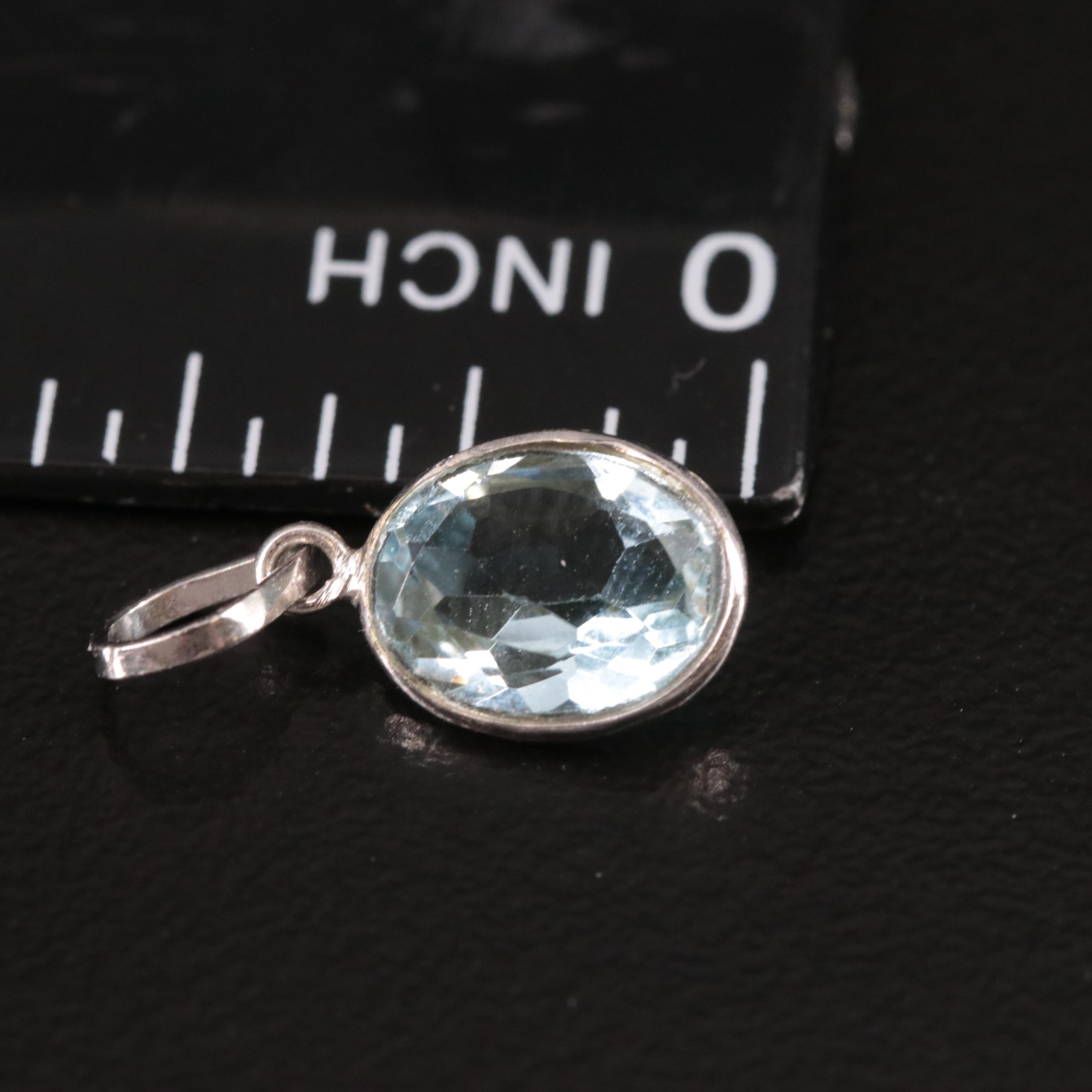 14K Blue Topaz Pendant