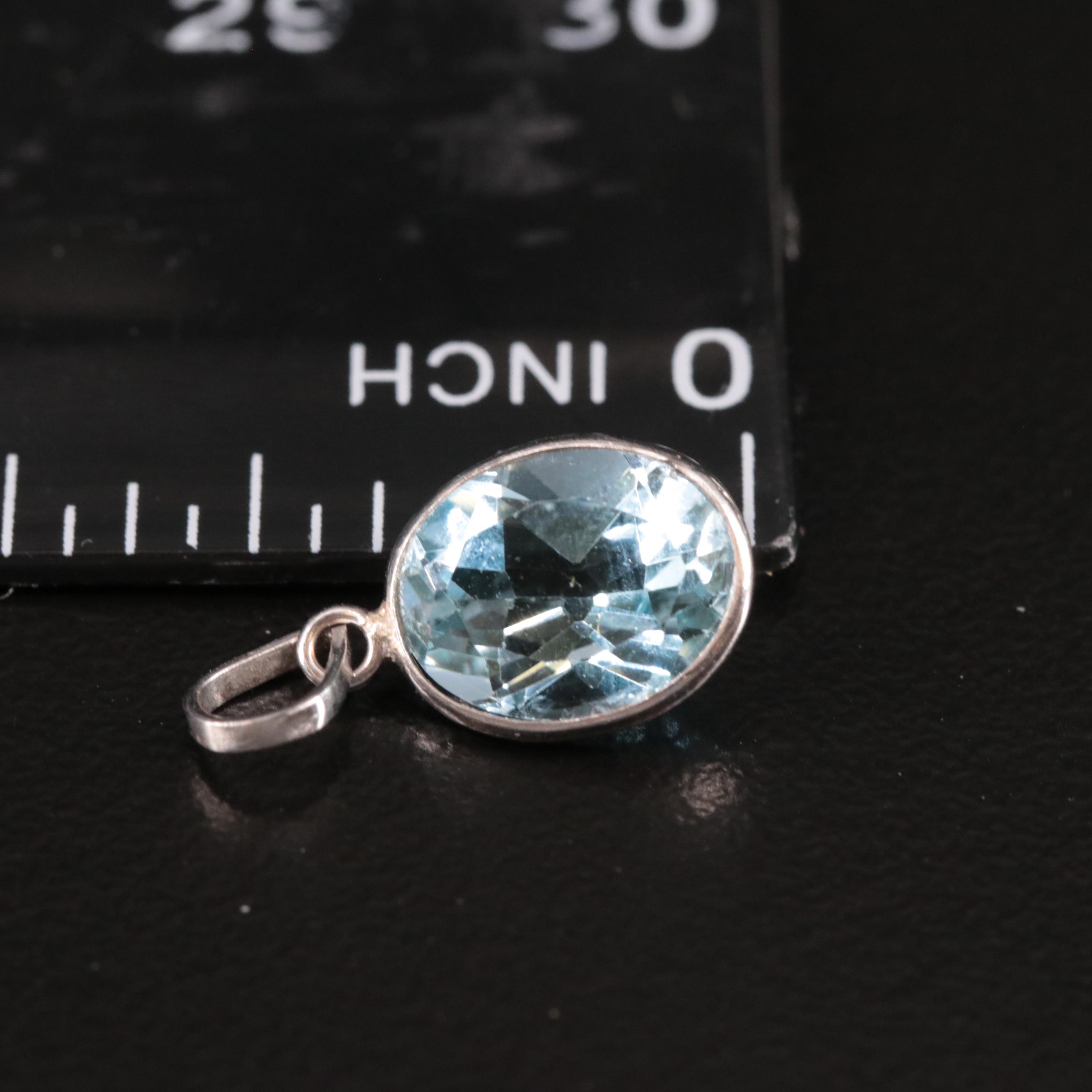 14K Blue Topaz Pendant