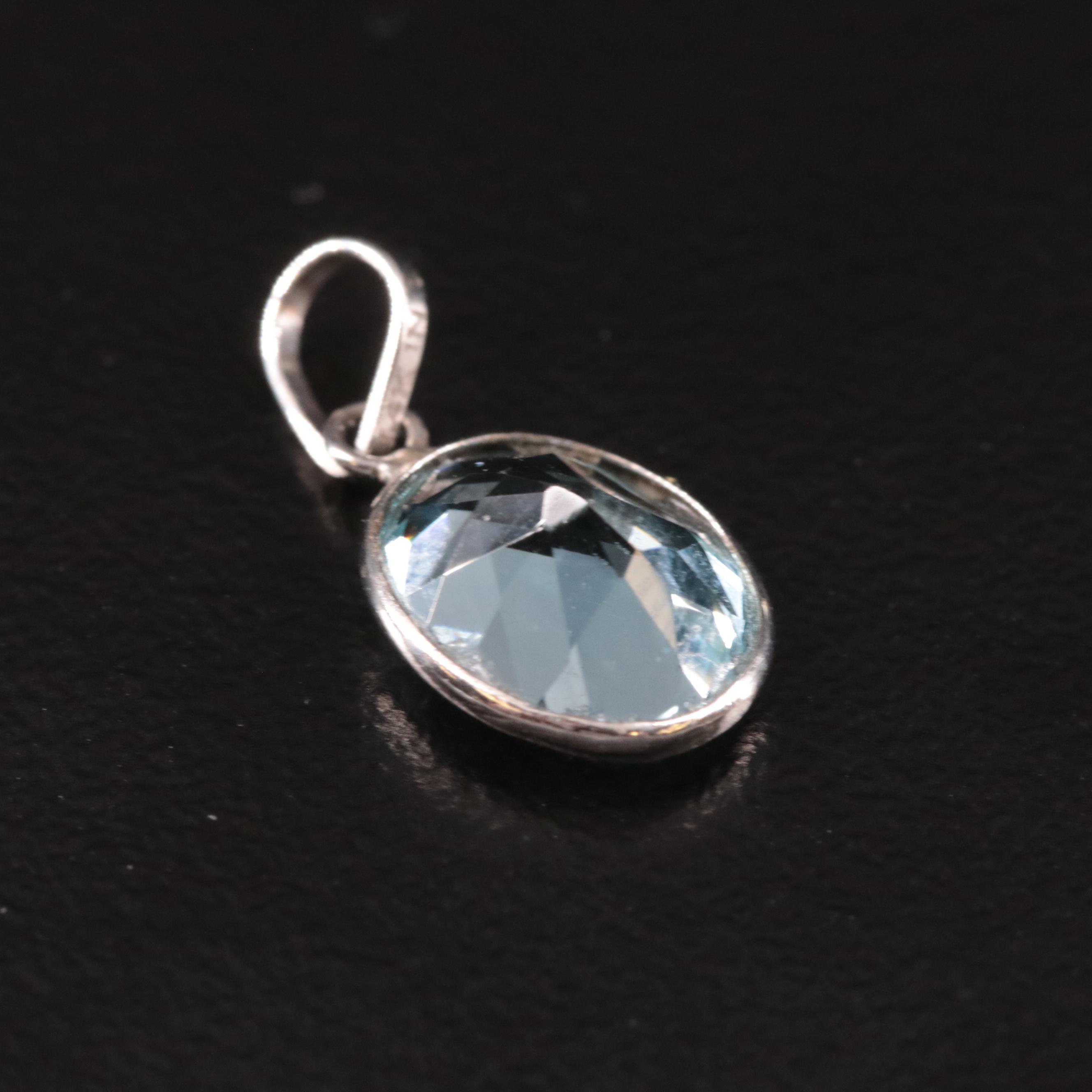 14K Blue Topaz Pendant