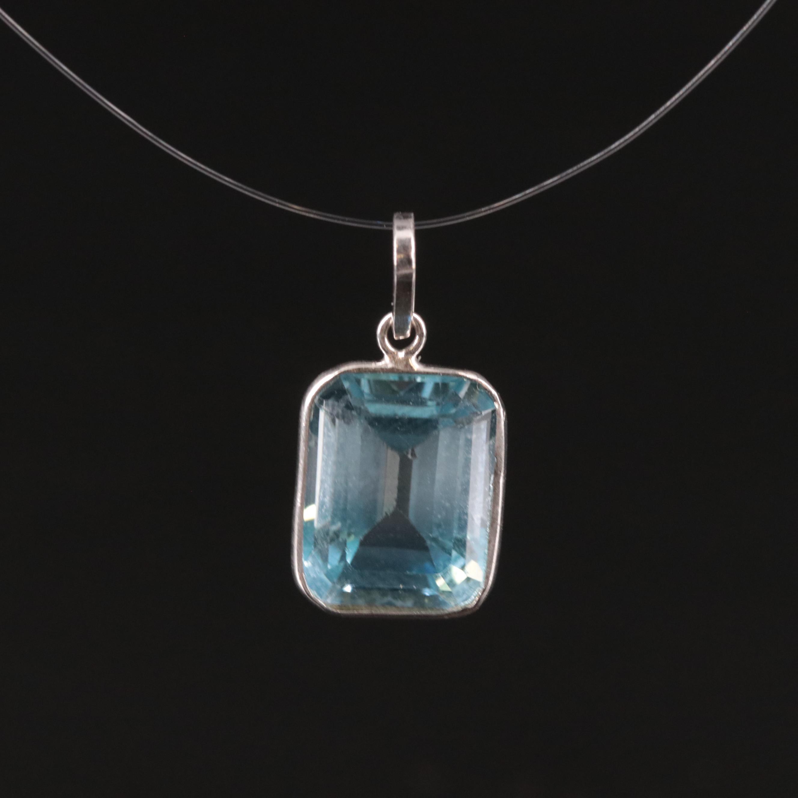 14K Blue Topaz Pendant