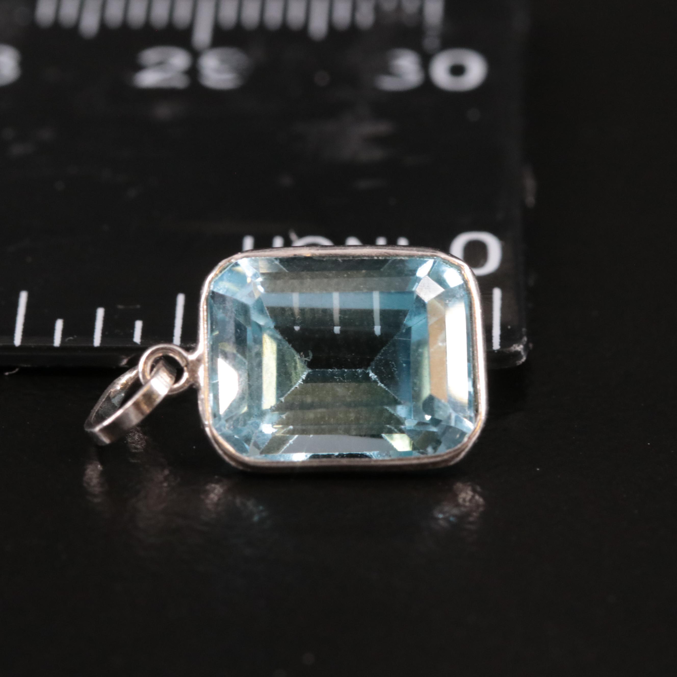 14K Blue Topaz Pendant