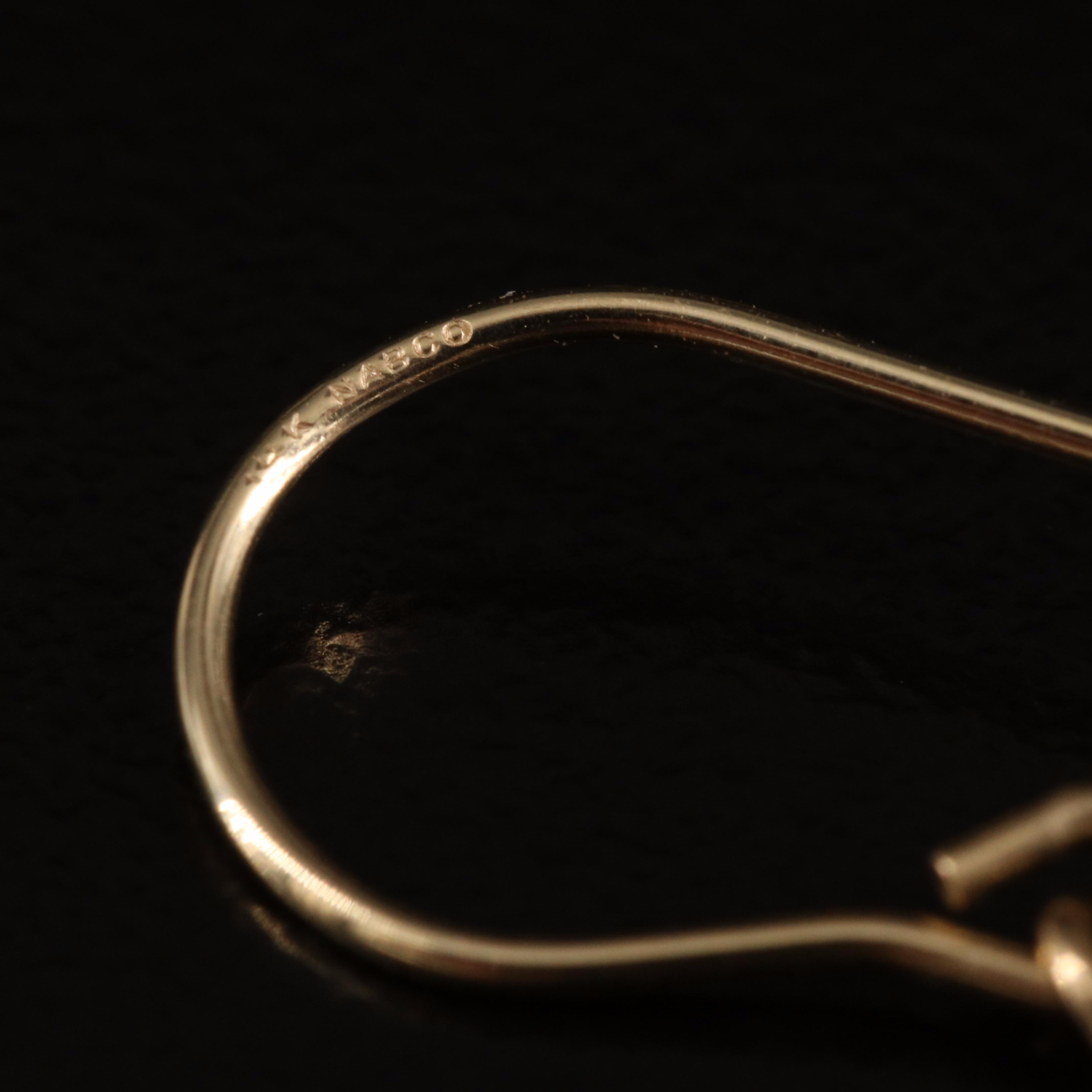 14K Double Heart Pendulum Earrings