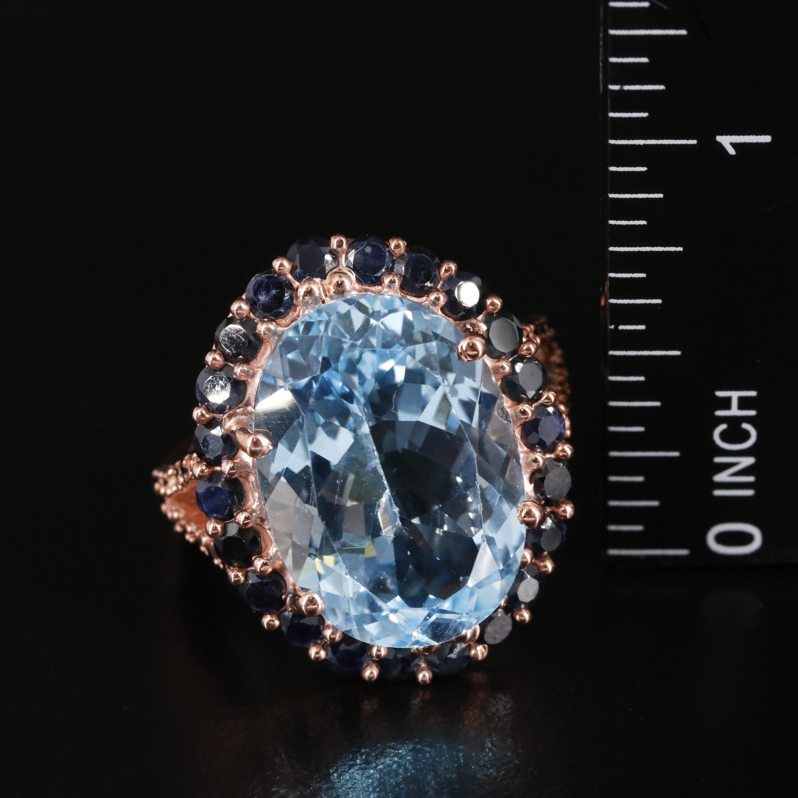 Sterling Blue Topaz and Sapphire Halo Ring