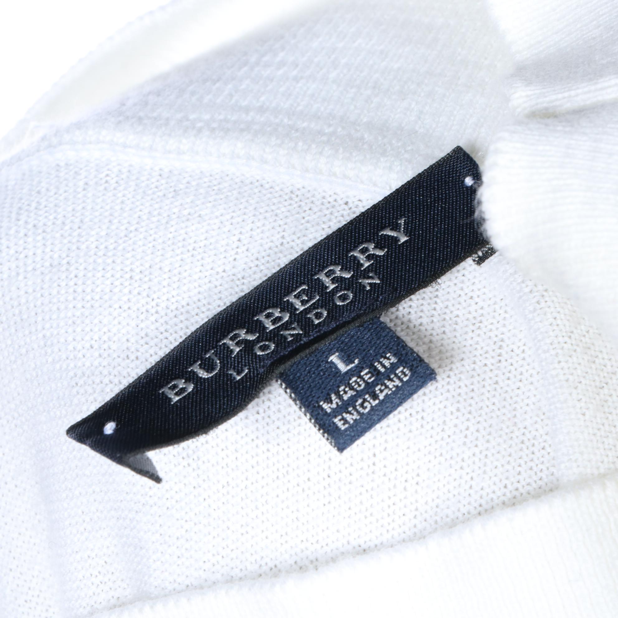 Burberry Sleeveless Knit Top and A|X Armani Exchange Wool Blend Shirt