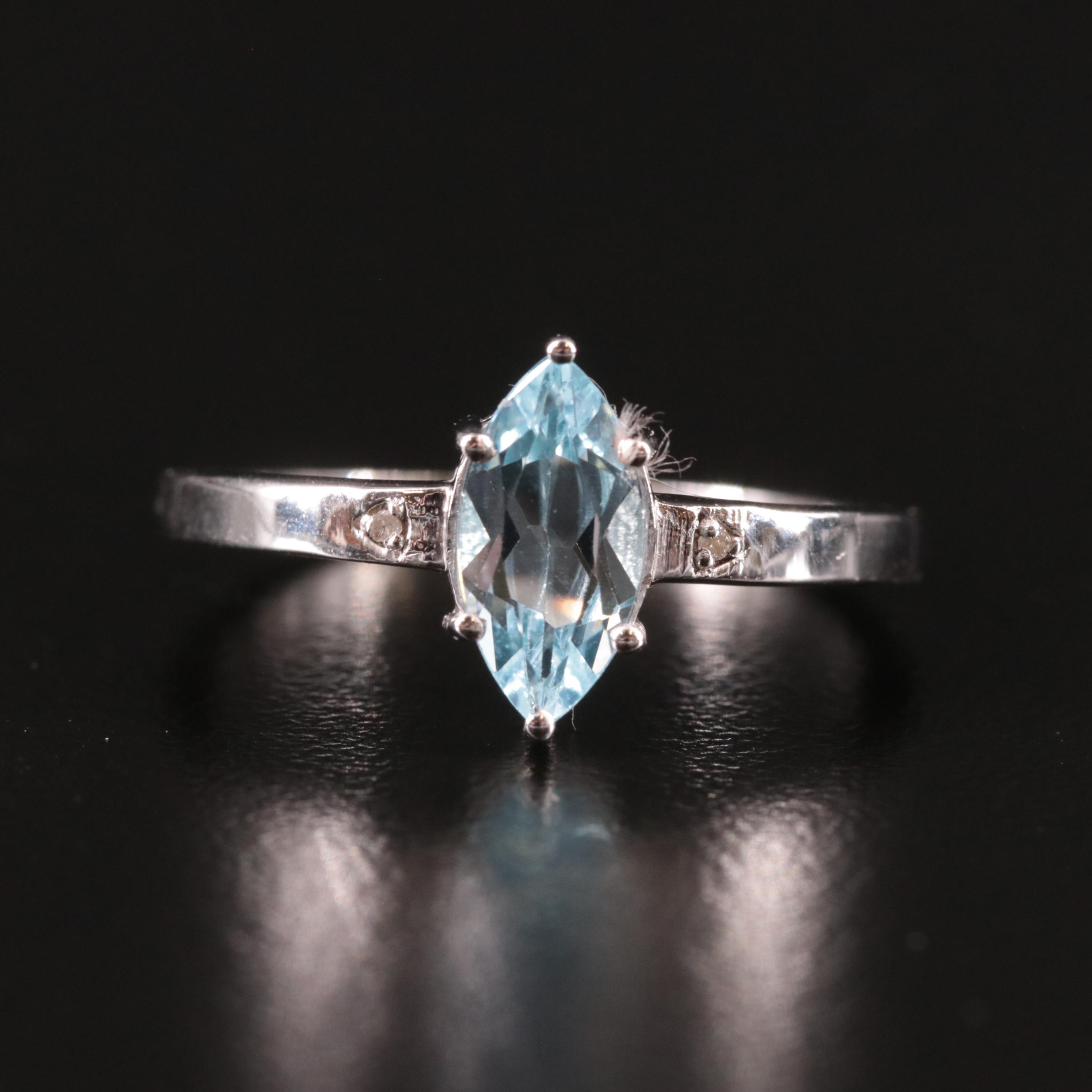 Sterling Blue Topaz and Diamond Ring