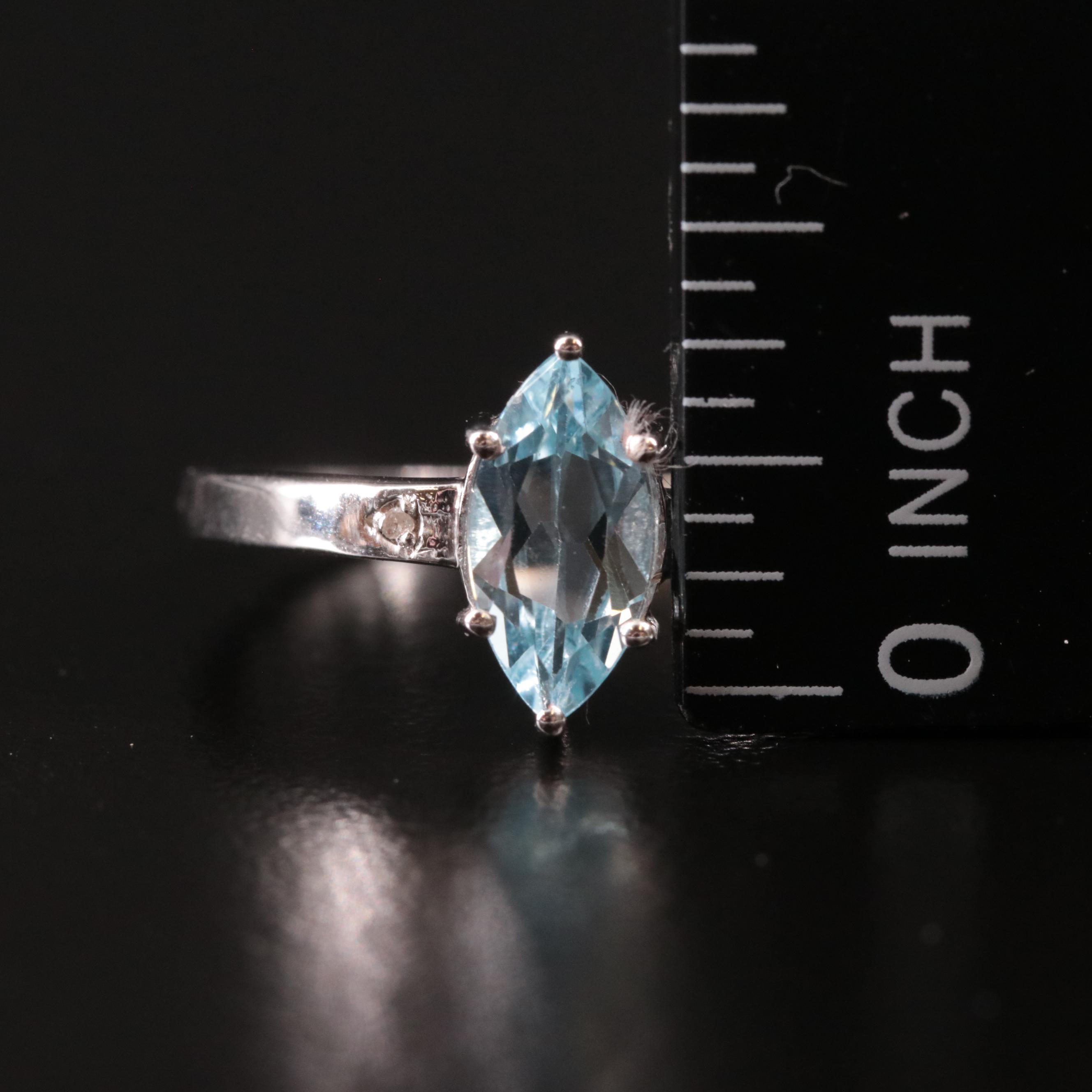Sterling Blue Topaz and Diamond Ring