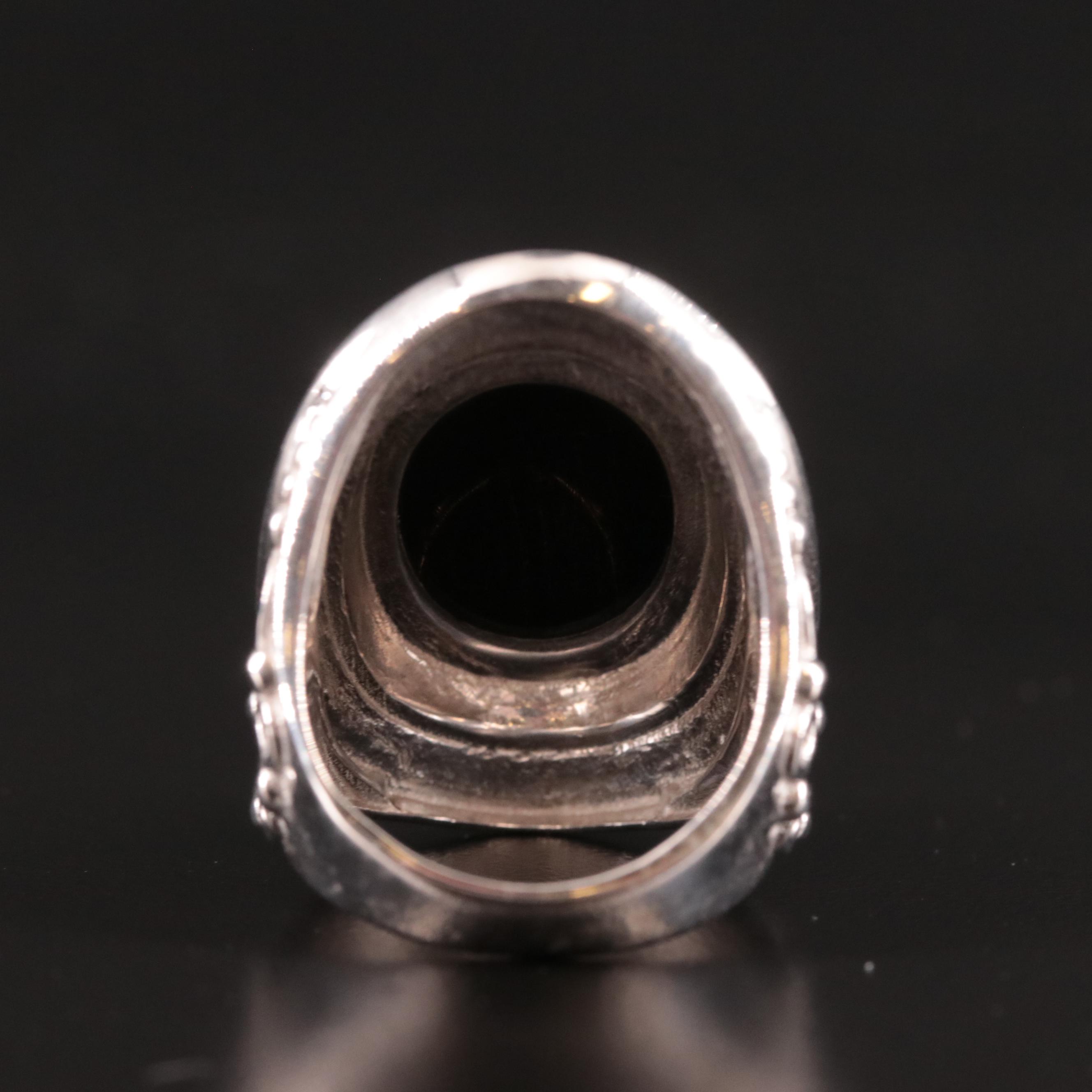 Sterling Black Onyx Saddle Ring with Scrollwork Accents