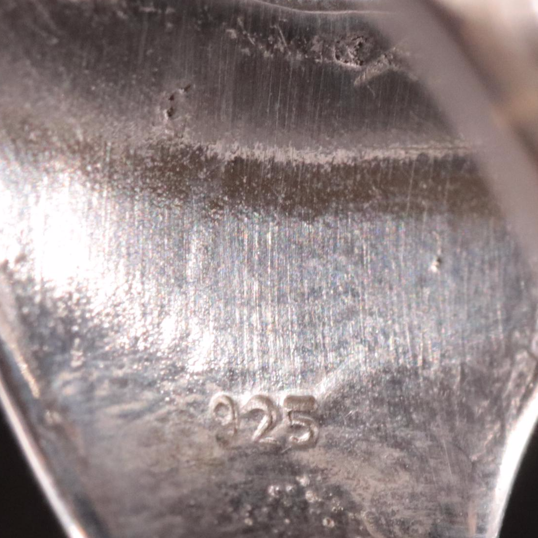 Sterling Black Onyx Saddle Ring with Scrollwork Accents