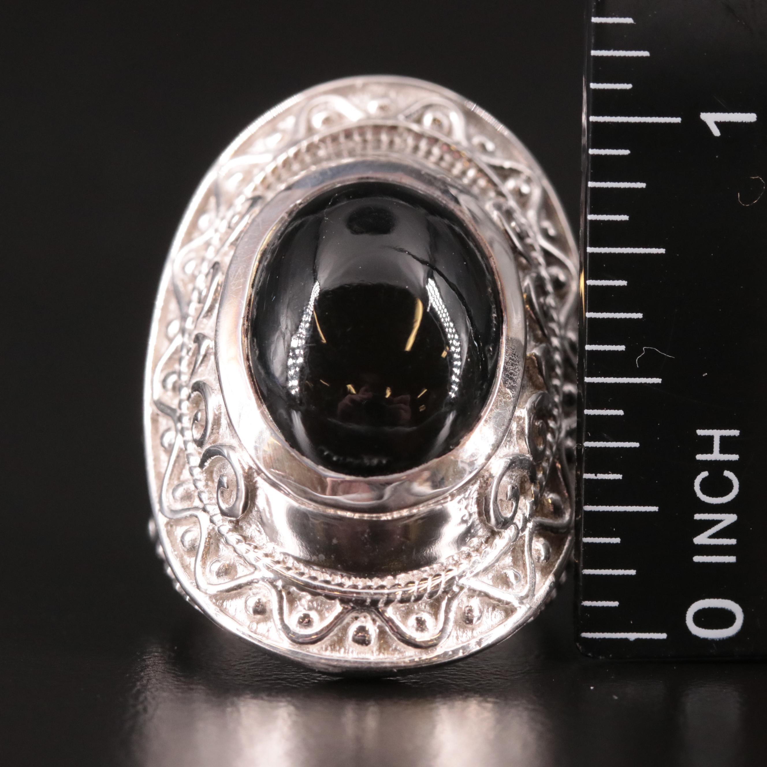 Sterling Black Onyx Saddle Ring with Scrollwork Accents