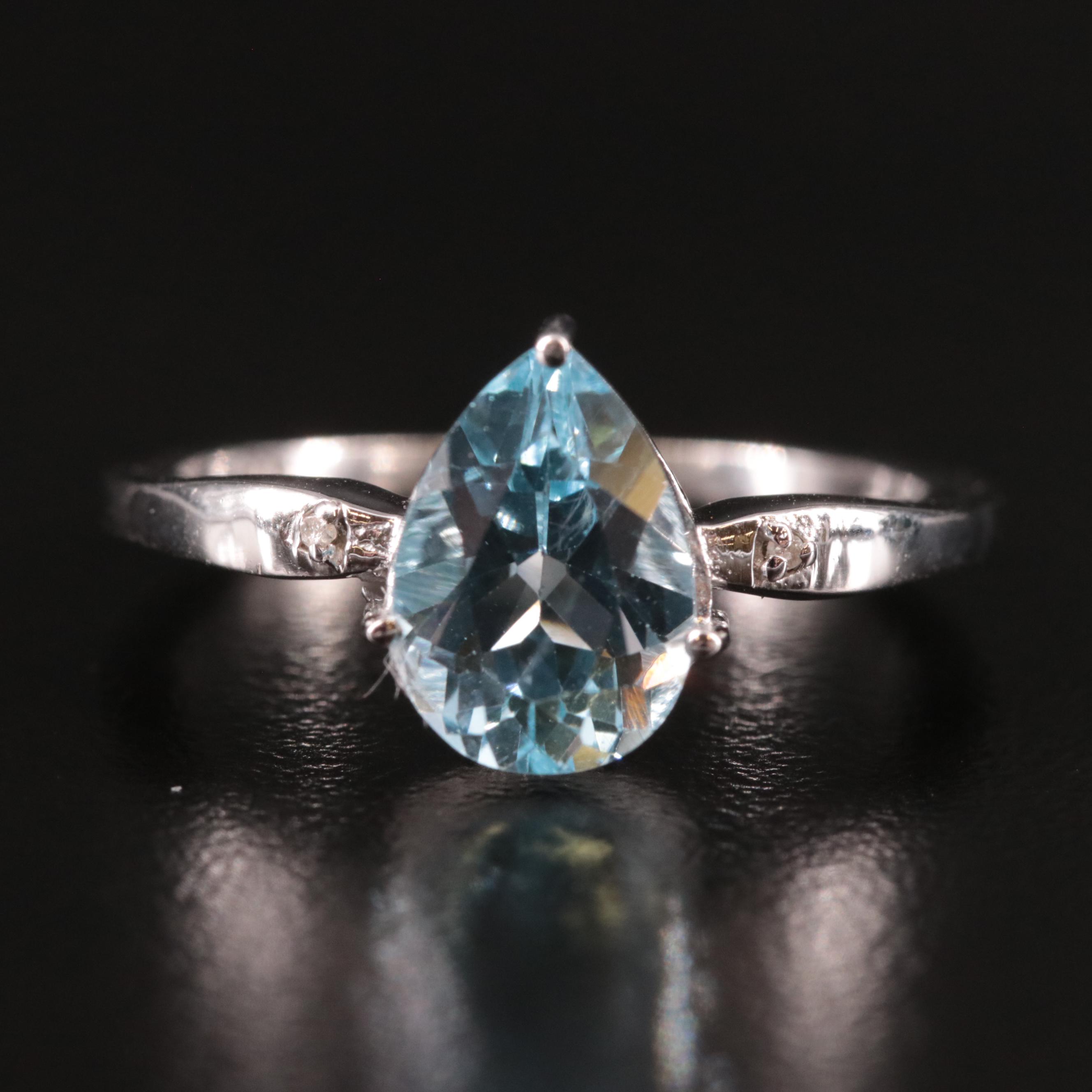 Sterling Blue Topaz and Diamond Ring
