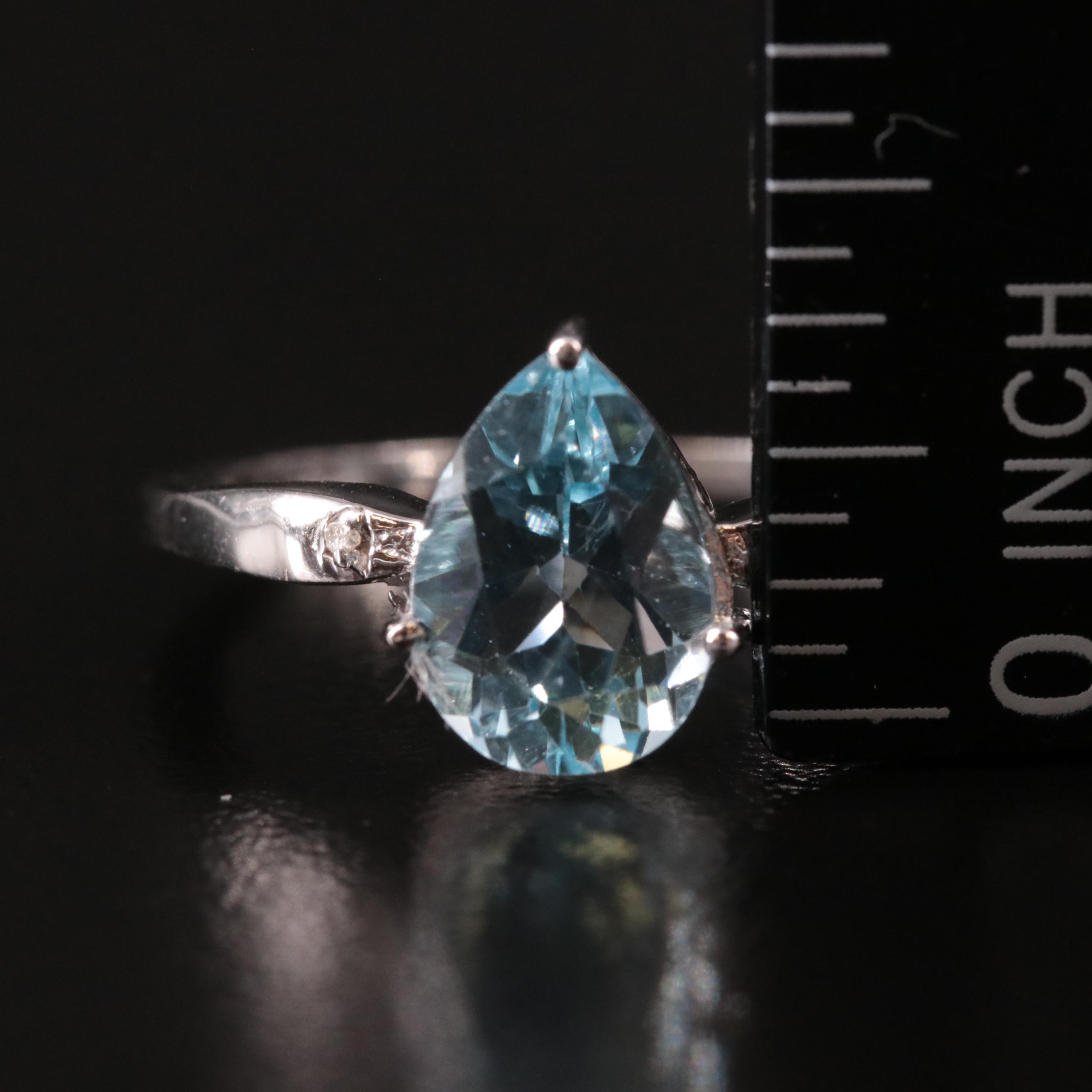 Sterling Blue Topaz and Diamond Ring