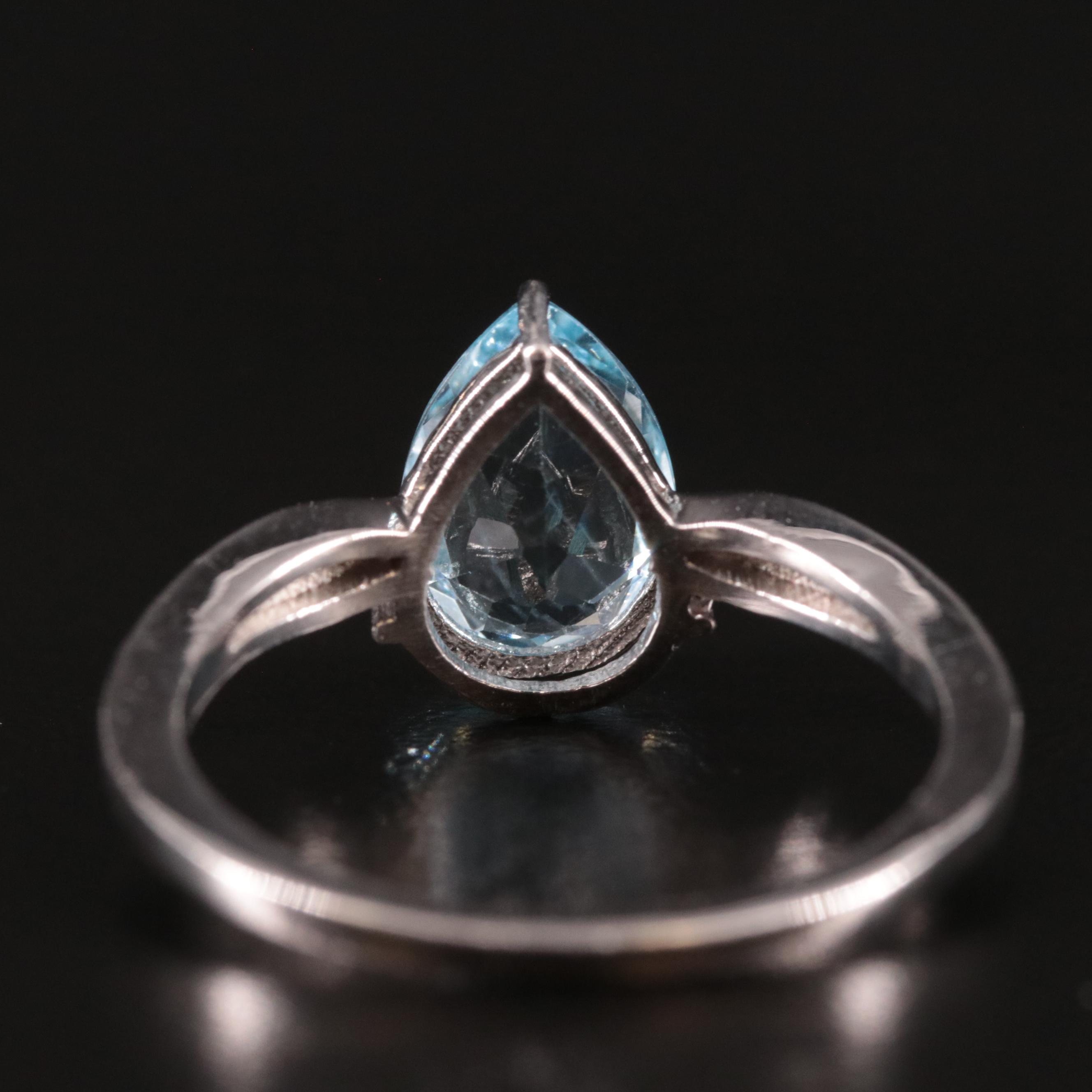 Sterling Blue Topaz and Diamond Ring