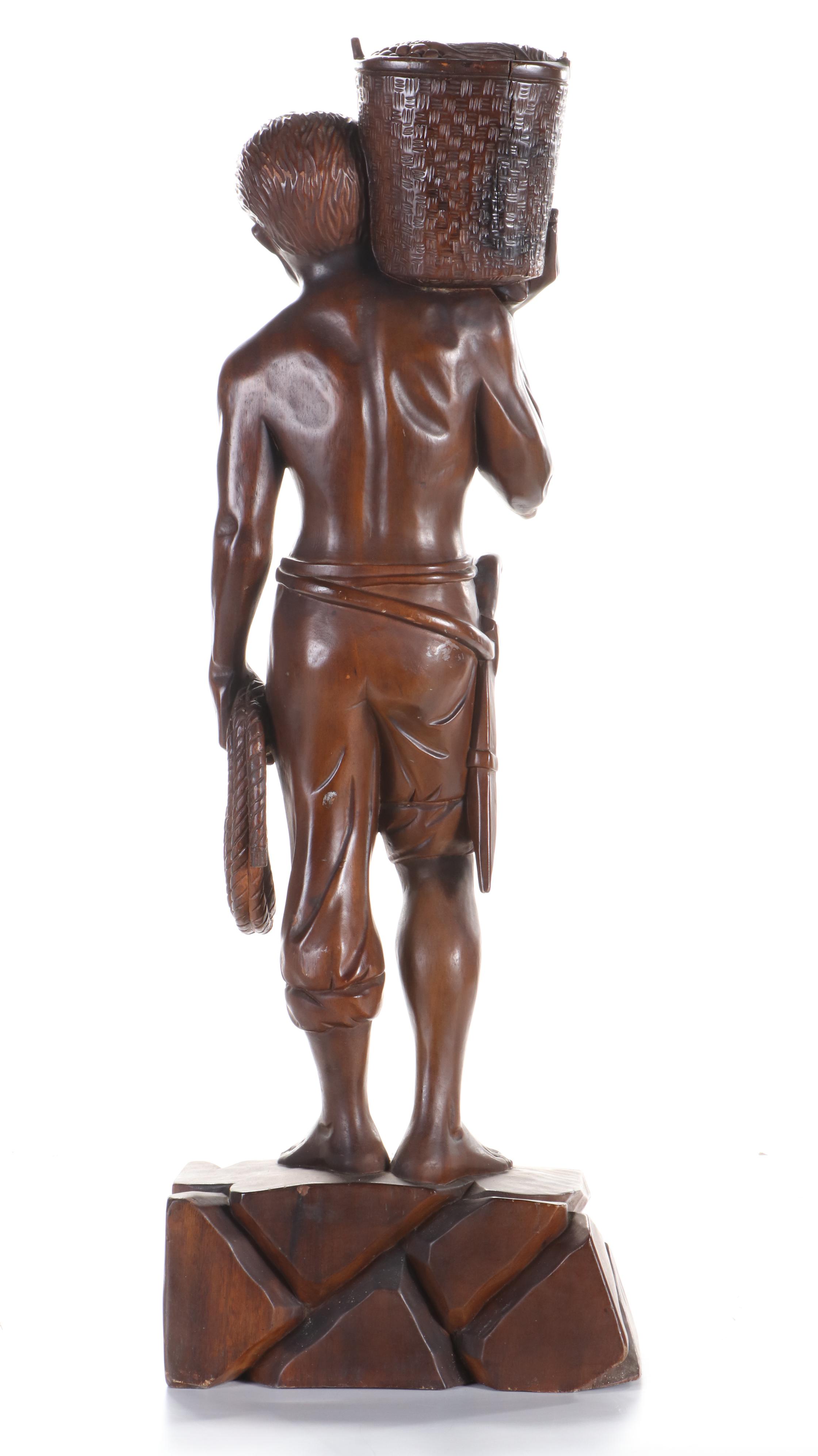 Carved Wood Sculpture of Young Man Carrying Basket, Late 20th Century