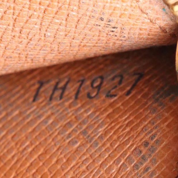 Louis Vuitton Sarah Wallet in Monogram Canvas and Leather