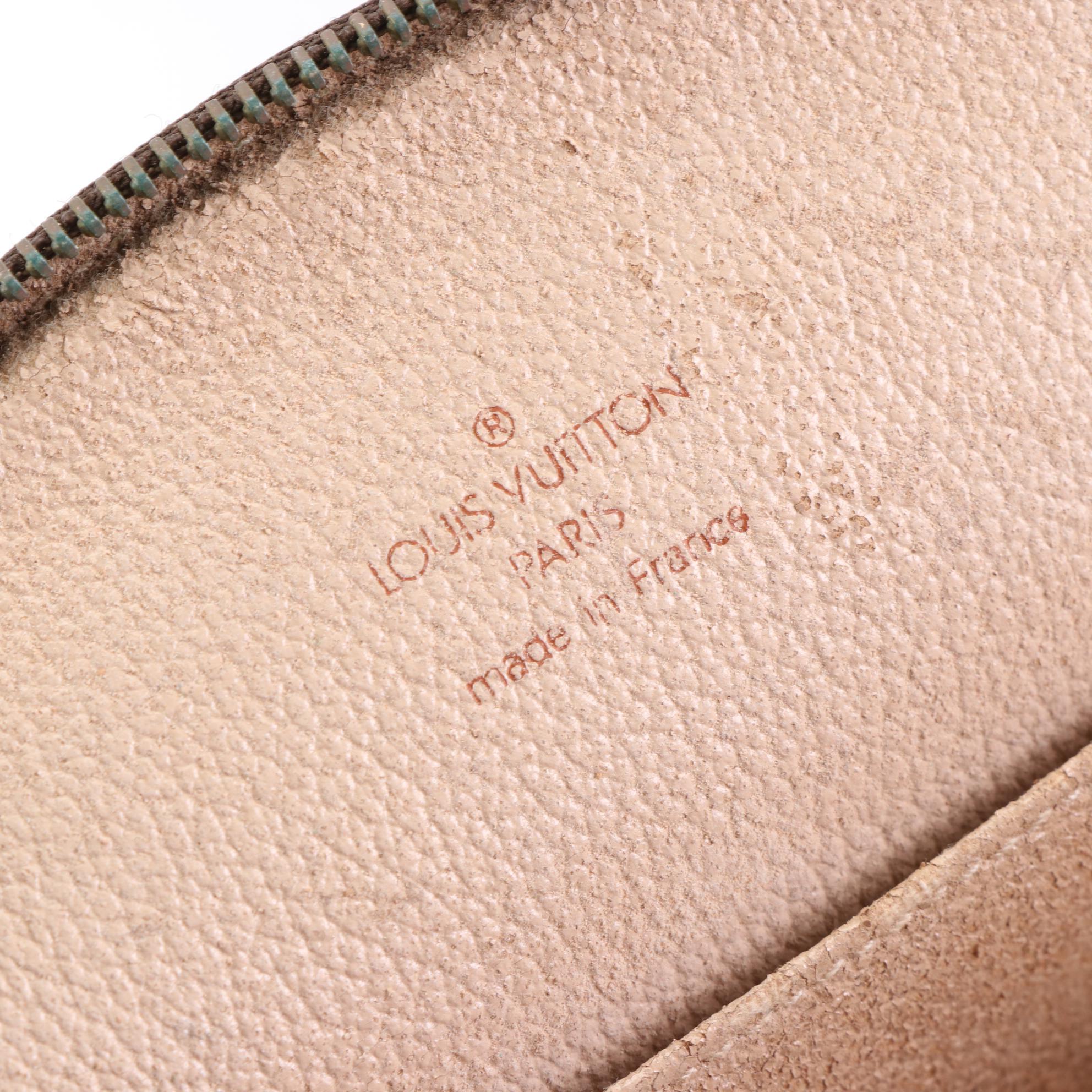 Louis Vuitton Trousse Demi Ronde Pouch in Monogram Canvas