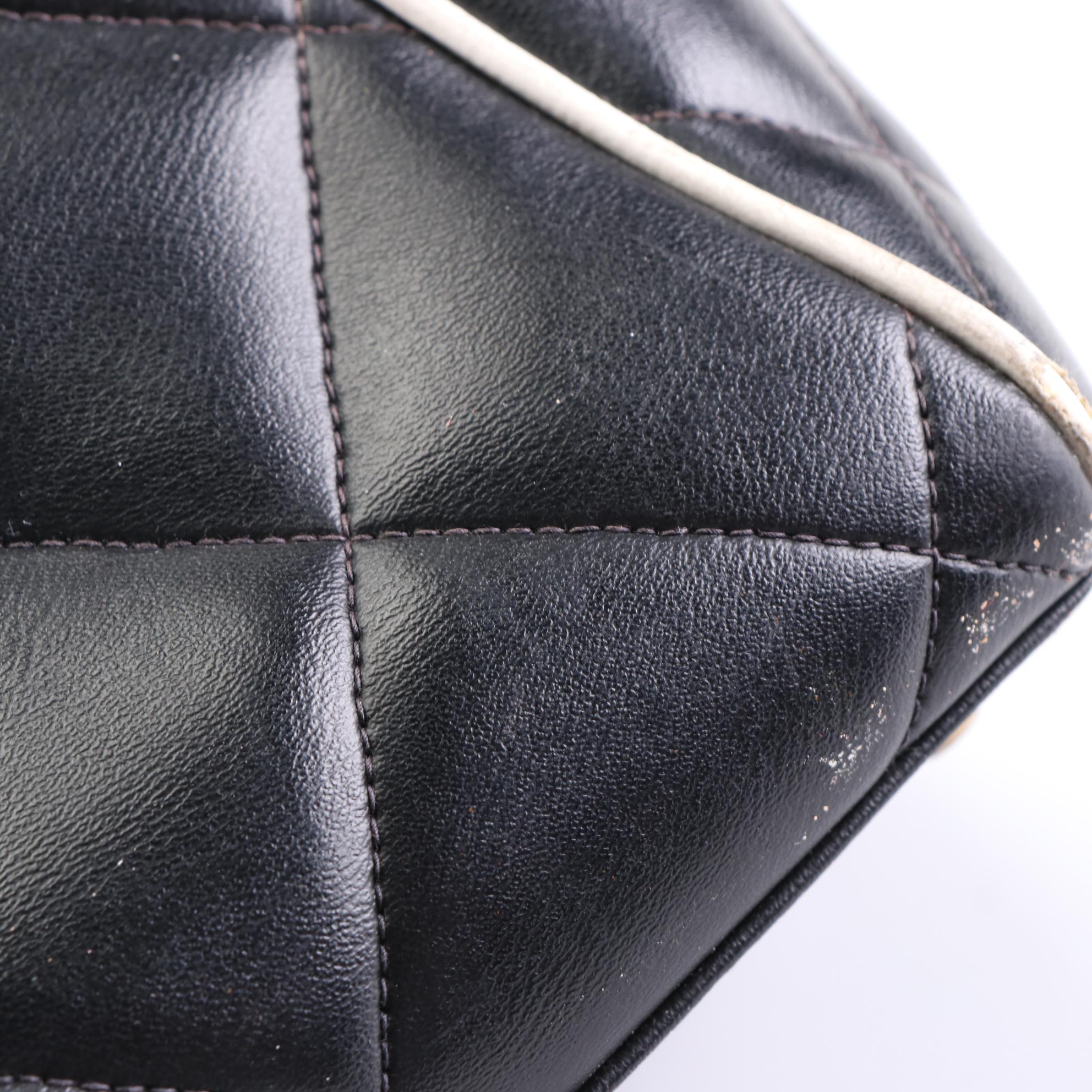 Chanel Logo Weekender Bag in Quilted Diamond Stitch Leather